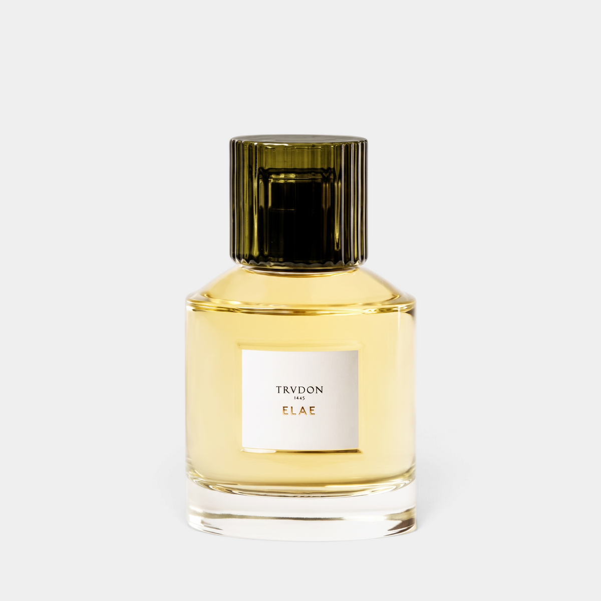 Shop Rescue Spa Trudon Elae Eau De Parfum in a clear glass bottle with a dark green ribbed cap