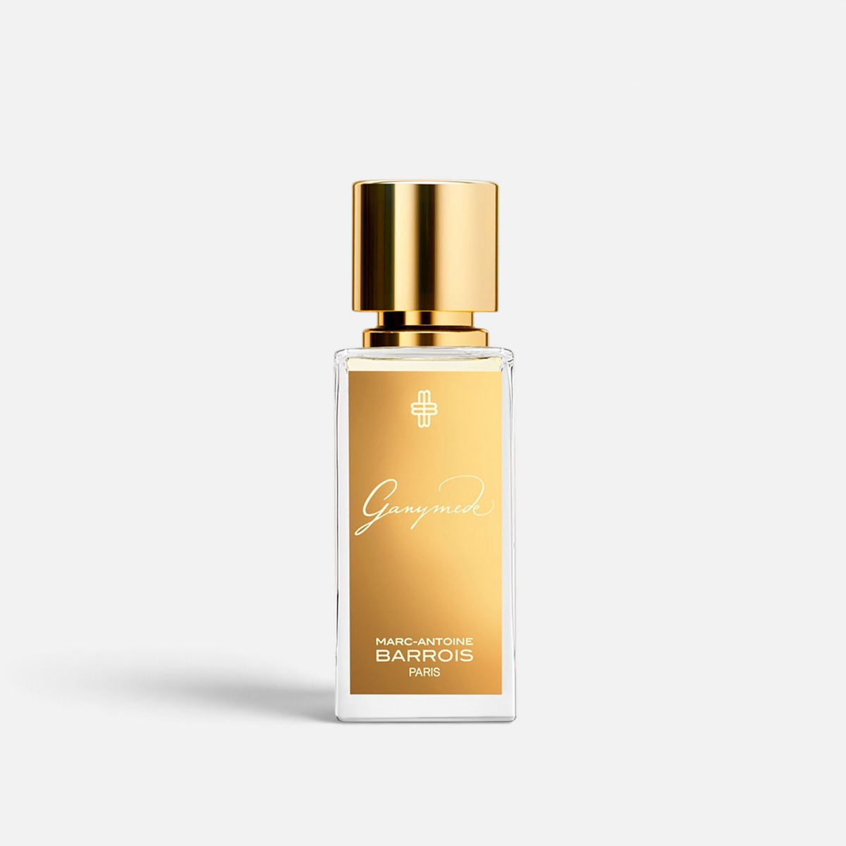 Shop Rescue Spa Ganymede Eau de Parfum in a clear glass bottle with a metallic gold label and matching gold cap.