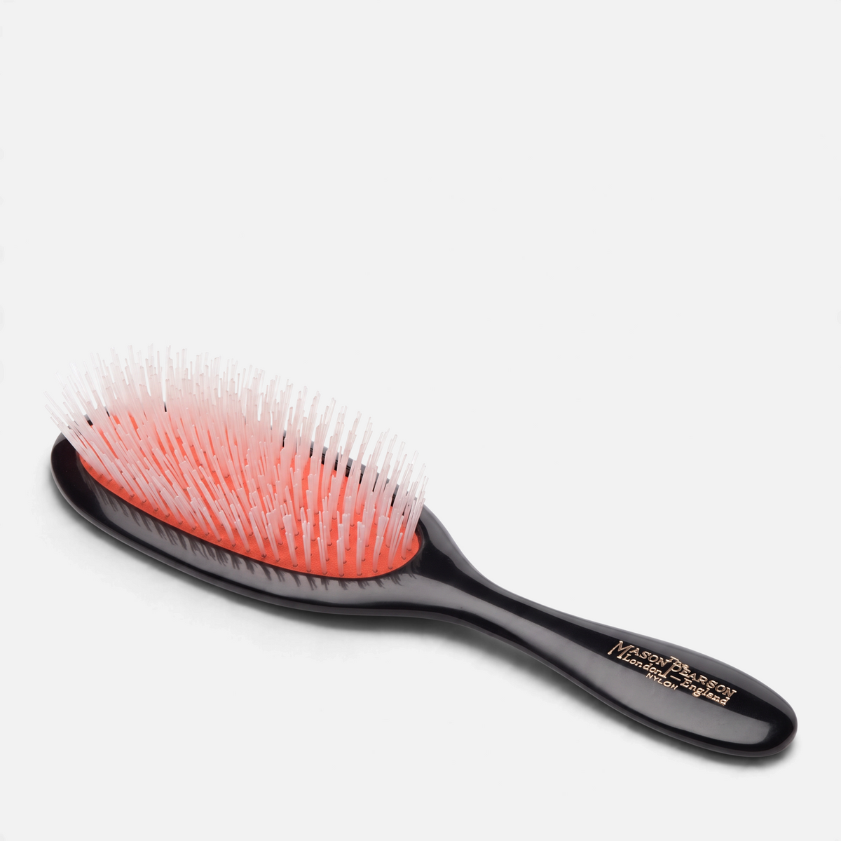 Shop Rescue Spa Handy Nylon Hairbrush N3 with black cellulose acetate handle and pink rubber cushion for detangling.