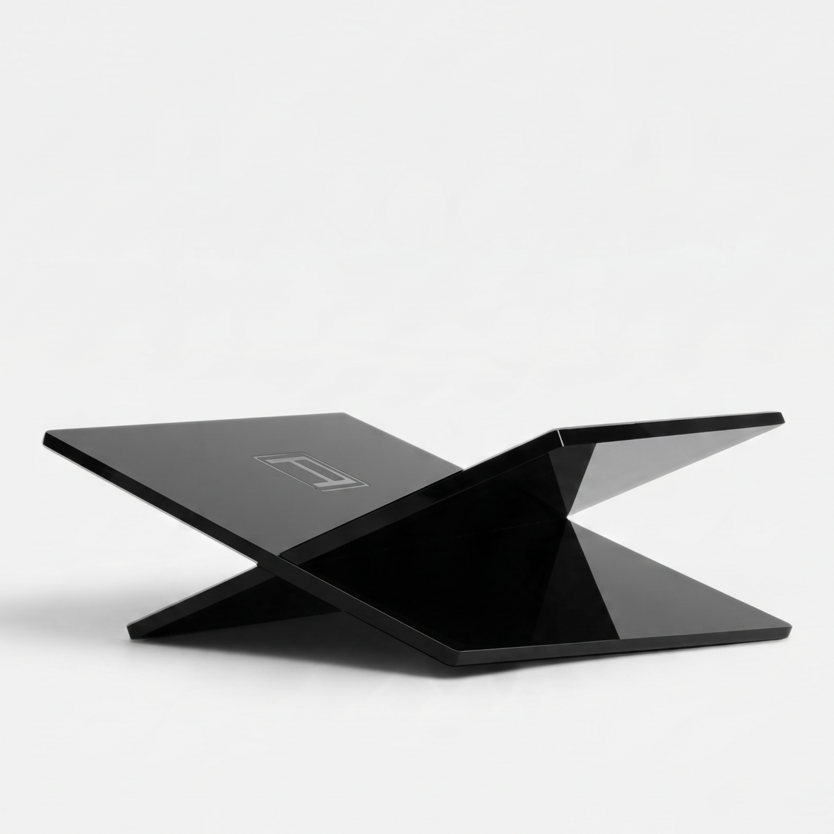 Shop Rescue Spa black Assouline bookstand with engraved A logo, elegant minimalist design for displaying large books.