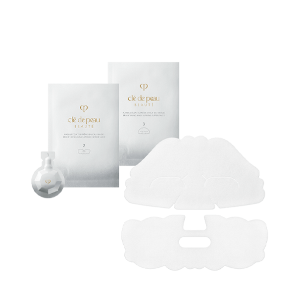 Clé de Peau sheet mask unfolded showing full facial contour fit