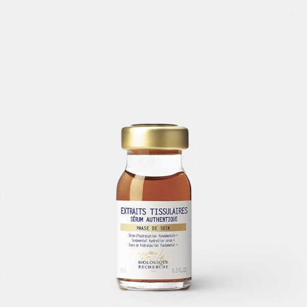 Biologique Recherche Serum Extraits Tissulaires – Glass serum bottle with gold cap containing brown liquid, featuring a white label with dark blue Biologique Recherche branding, shown on a white background. Size 0.3