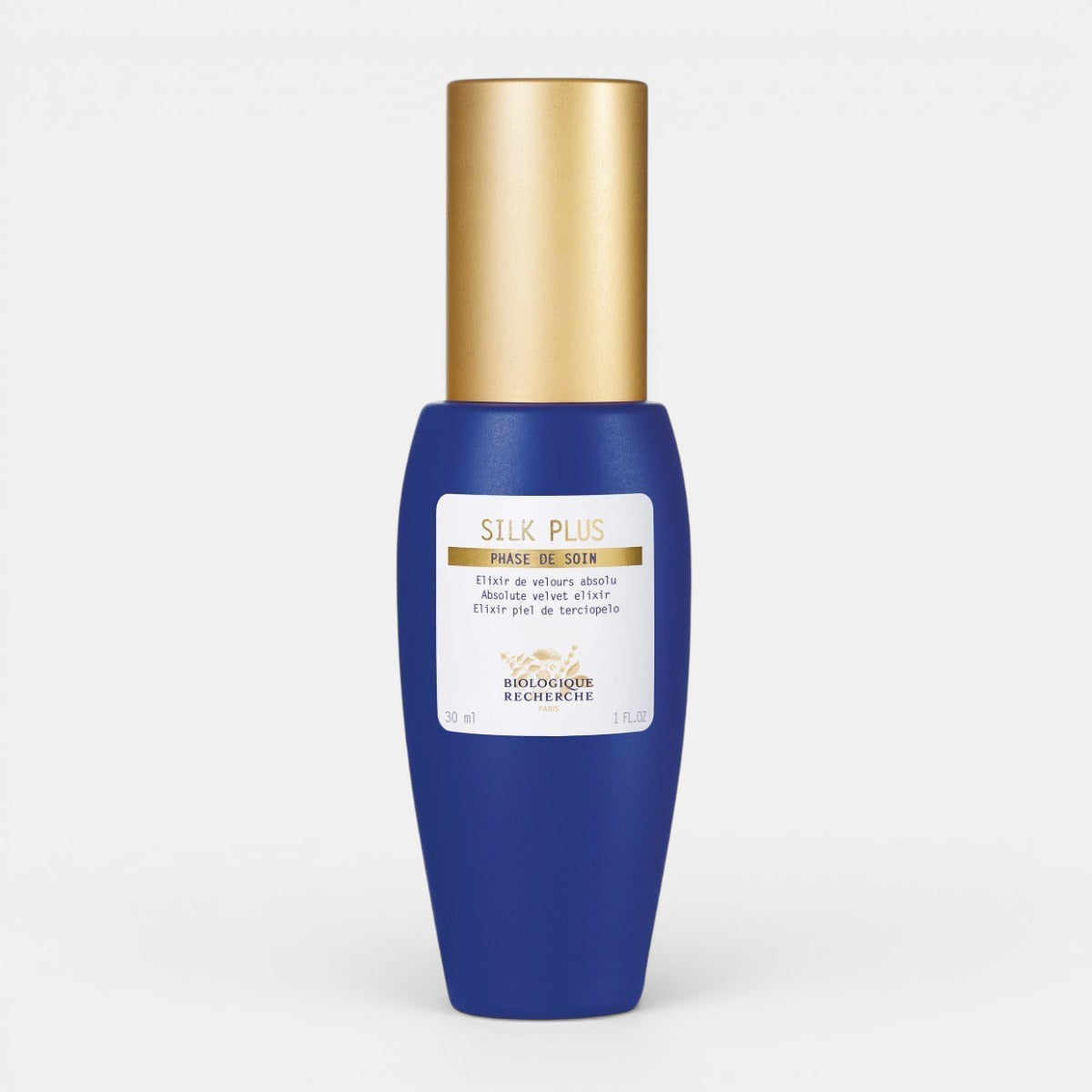 Blue Biologique Recherche Silk Plus bottle with gold cap on a white background. Mattifying & Soothing Serum for Sensitive, Oily Skin.