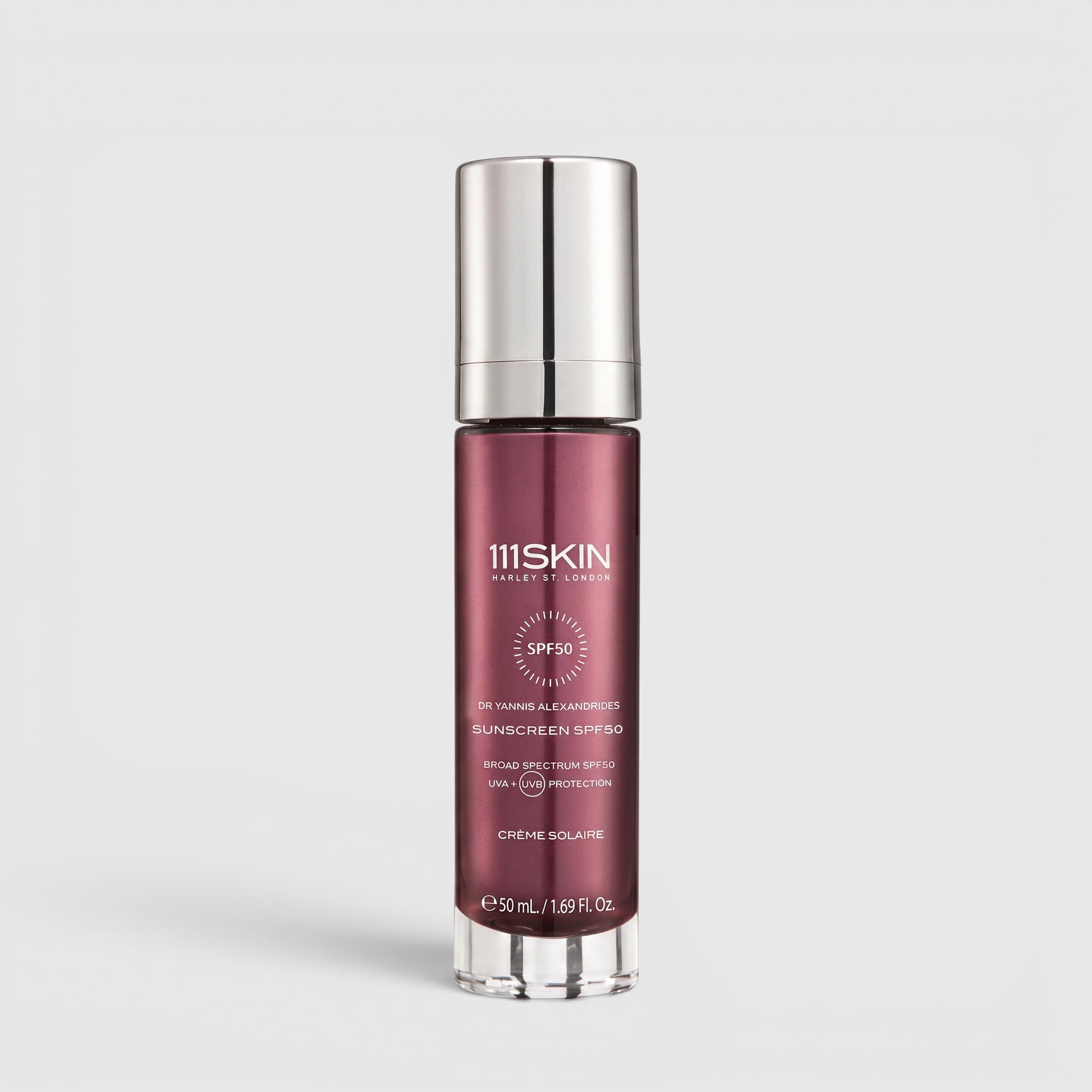 Shop Rescue Spa 111SKIN SPF50 broad-spectrum sunscreen in a sleek metallic burgundy pump bottle for daily UV protection.