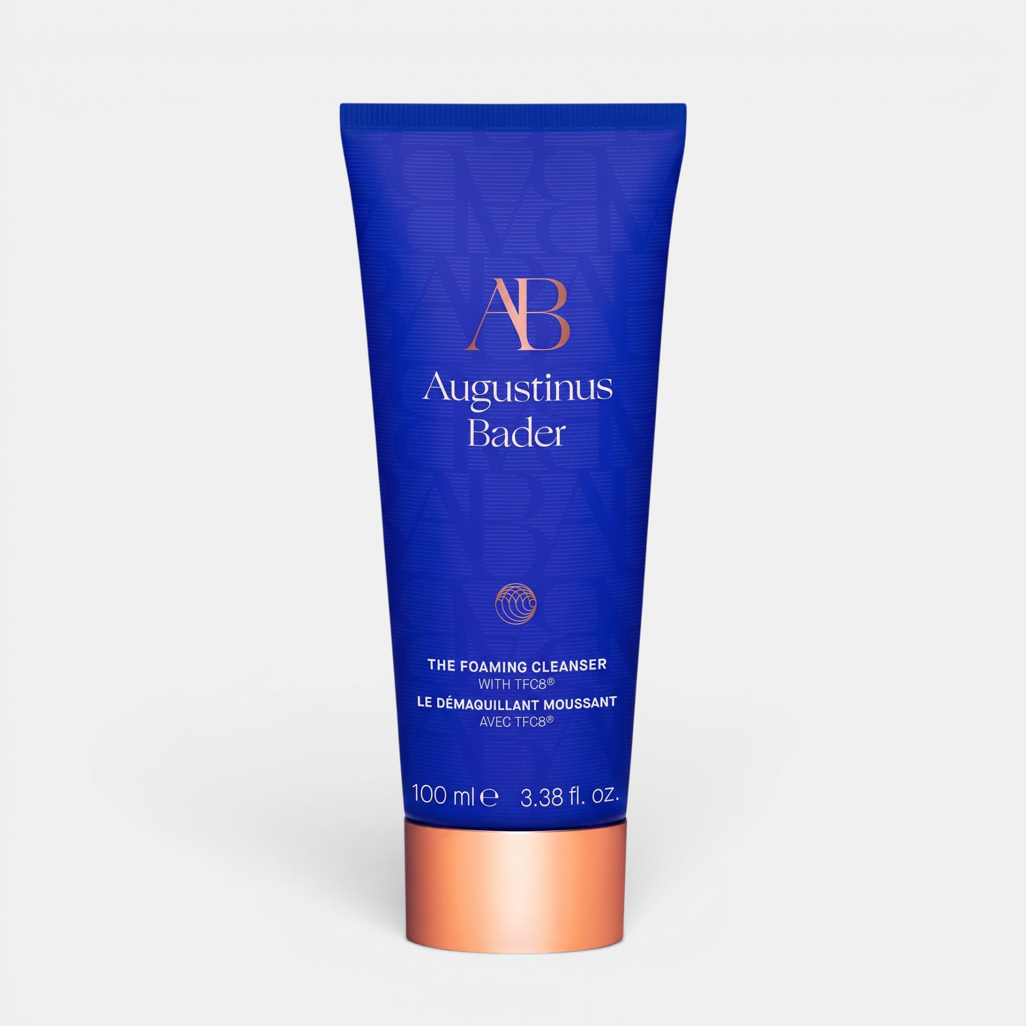 Shop Rescue Spa Augustinus Bader The Foaming Cleanser in a blue tube with copper cap for purifying and makeup removal.