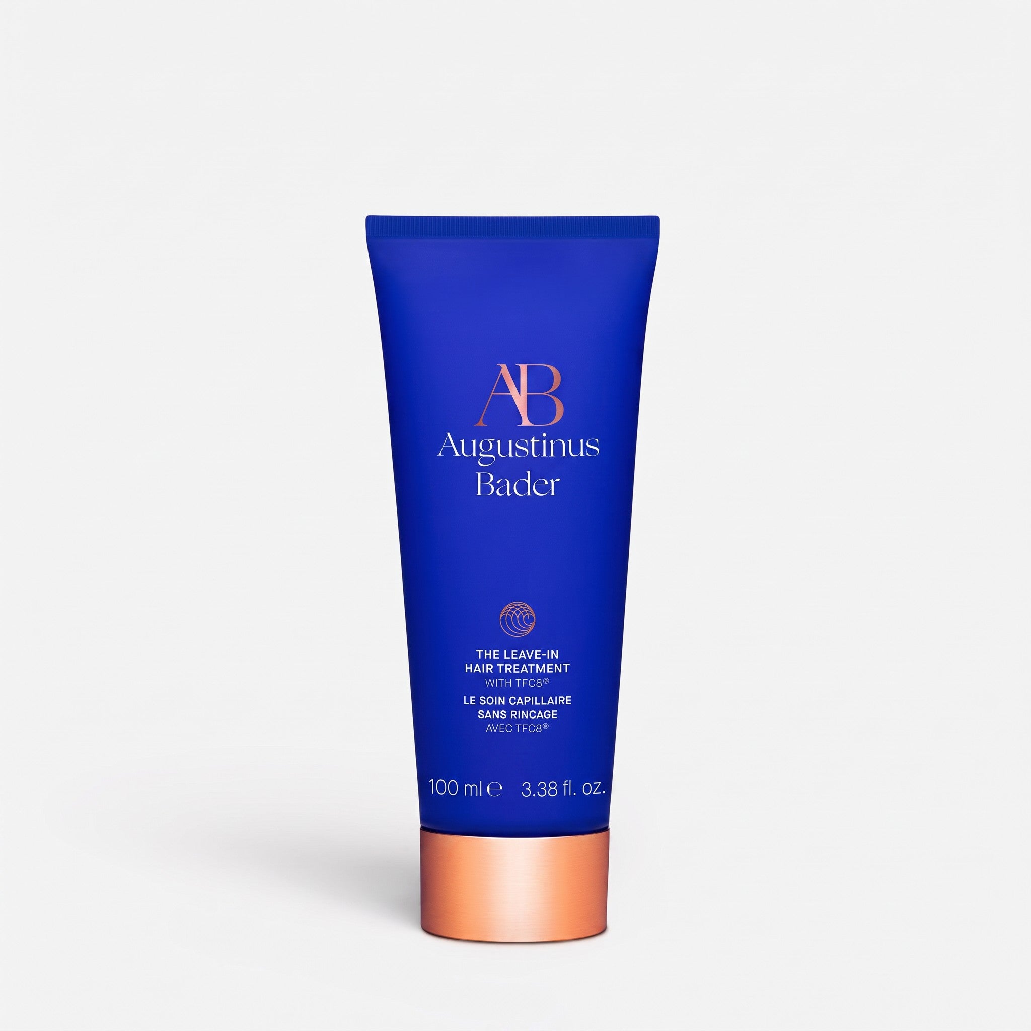 Shop Rescue Spa Augustinus Bader Leave-In Hair Treatment in a blue 100ml squeeze tube with a metallic copper cap.