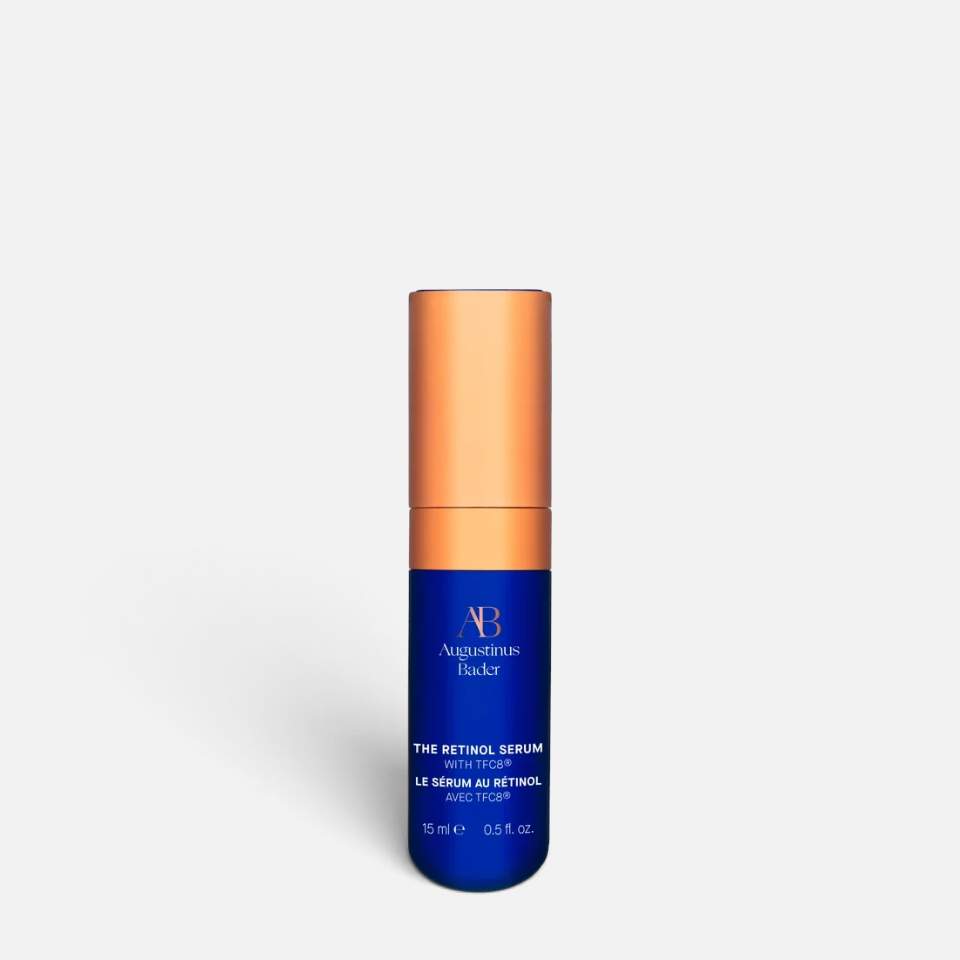 Shop Rescue Spa Augustinus Bader The Retinol Serum in a blue bottle with a metallic copper cap
