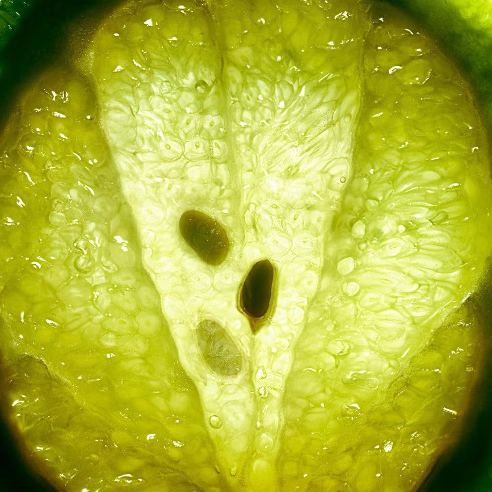 Shop Rescue Spa Aventus fragrance features fresh bergamot citrus notes in this macro fruit texture detail.