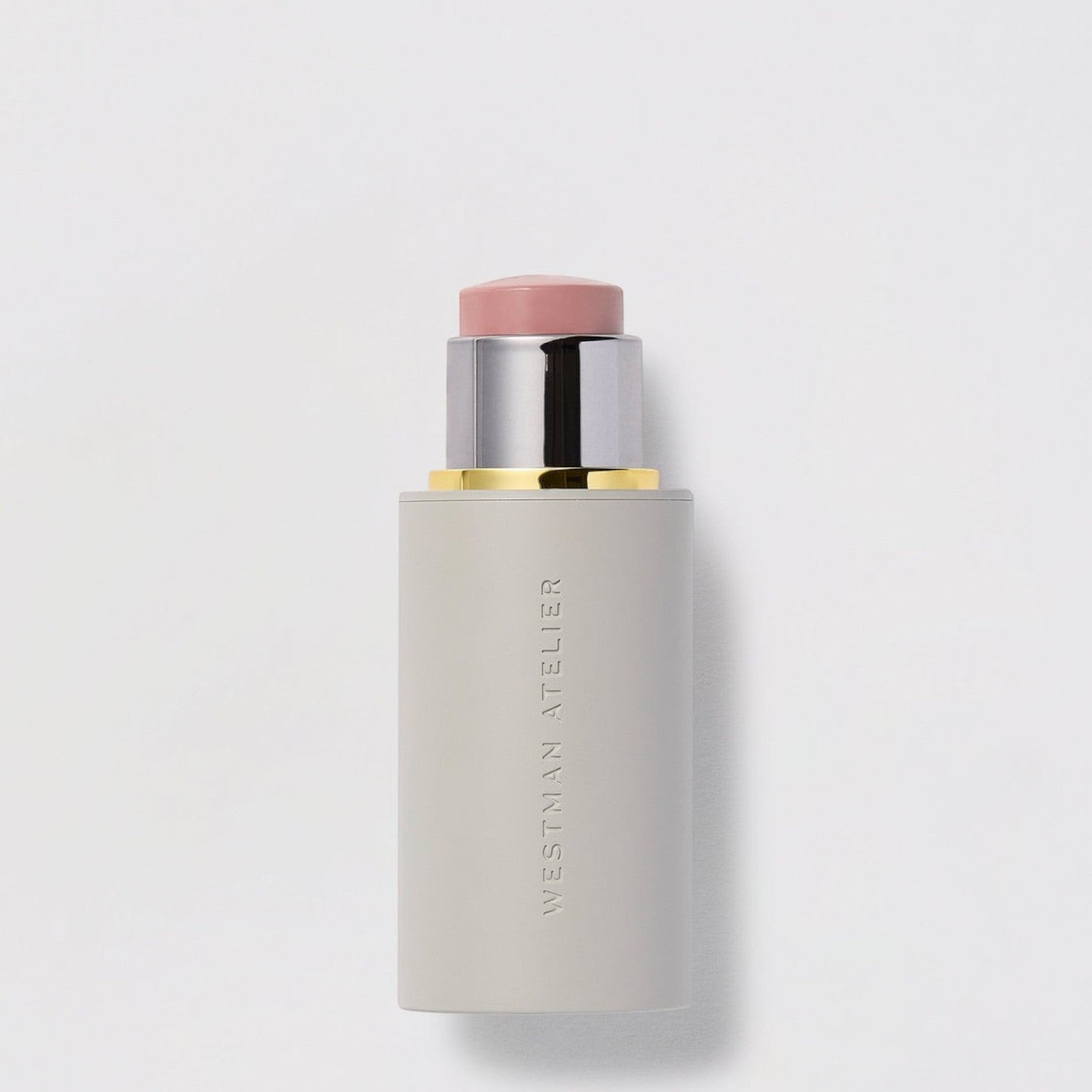 Shop Rescue Spa Baby Cheeks Blush Stick in a creamy pink shade with a sleek grey twist-up applicator tube.