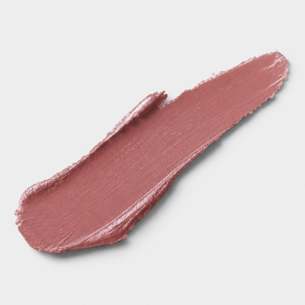 Shop Rescue Spa Baby Cheeks Blush Stick swatch in a creamy dusty rose shade with a smooth, hydrating finish.