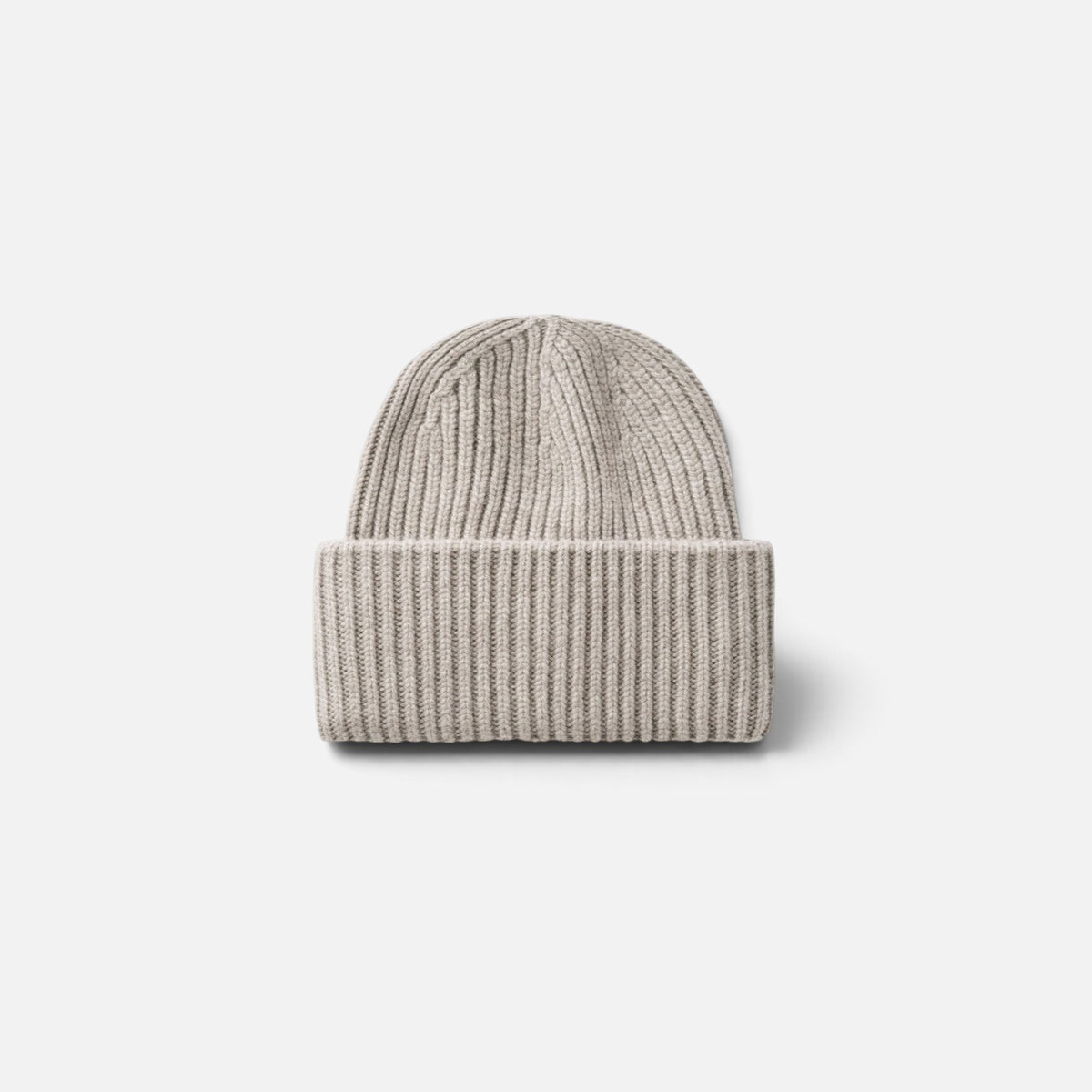 Shop Rescue Spa beige ribbed knit cashmere beanie with a folded cuff, unisex design.