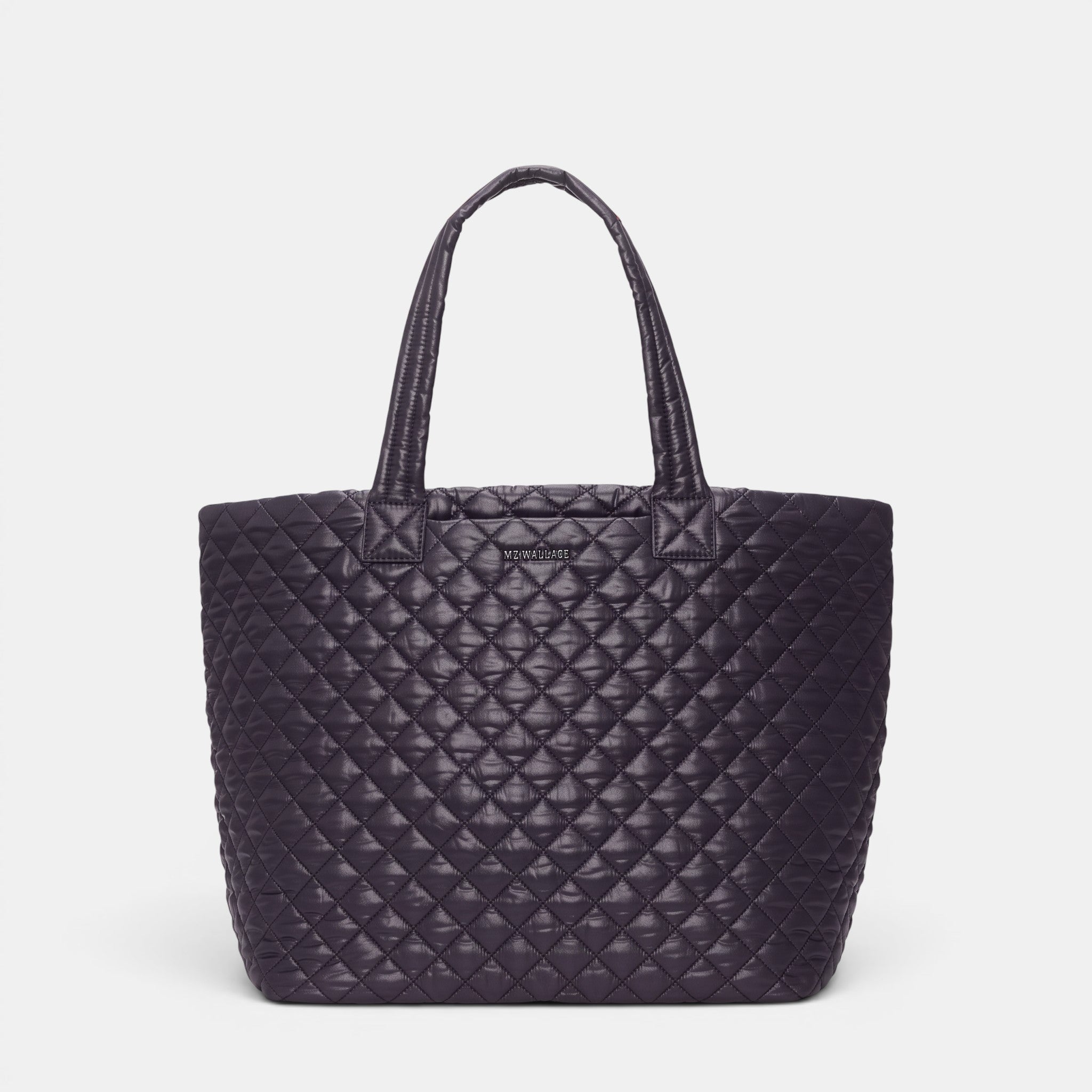 Shop Rescue Spa MZ Wallace black quilted Bedford nylon Large Metro Tote Deluxe II with leather trim.