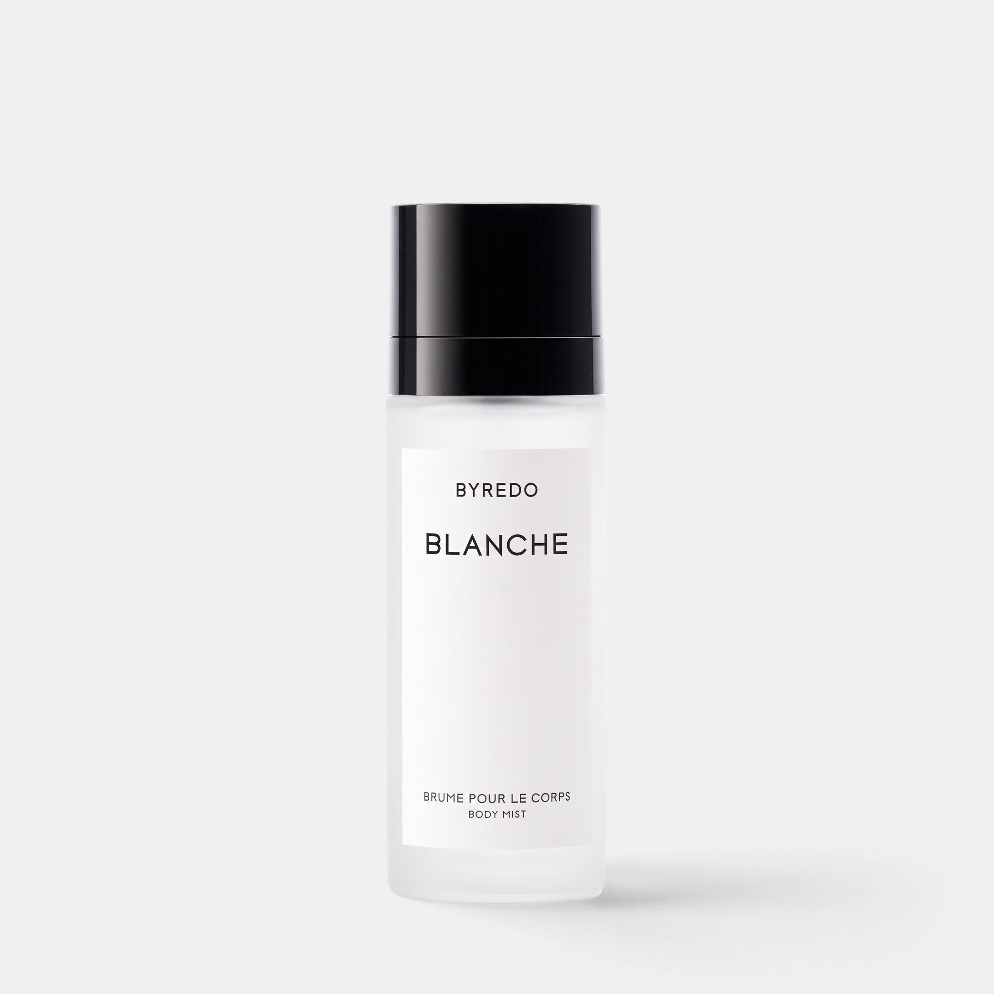Shop Rescue Spa Blanche body mist in a frosted glass bottle with a black cap, featuring a clean floral fragrance.