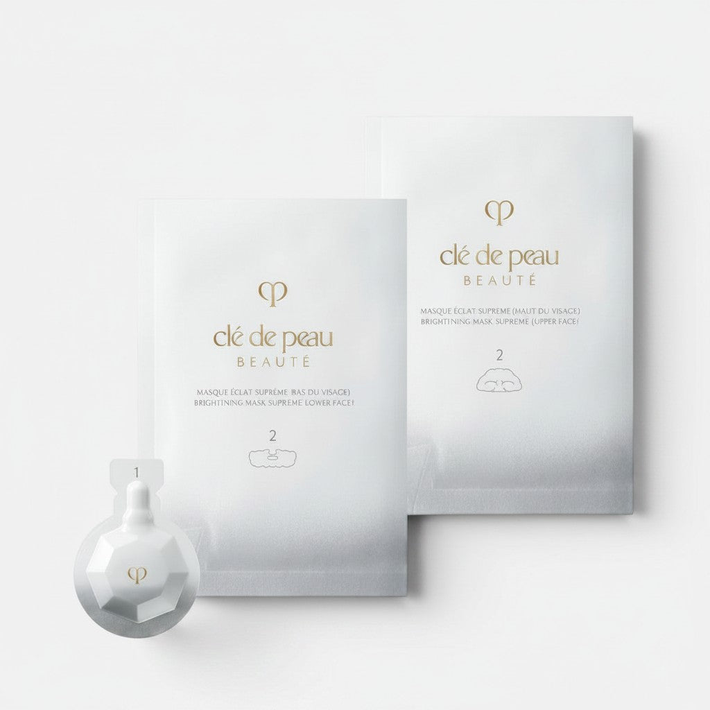 Shop Rescue Spa Cle de Peau Beaute Brightening Mask Treatment Supreme II two-step facial mask set in white packaging.