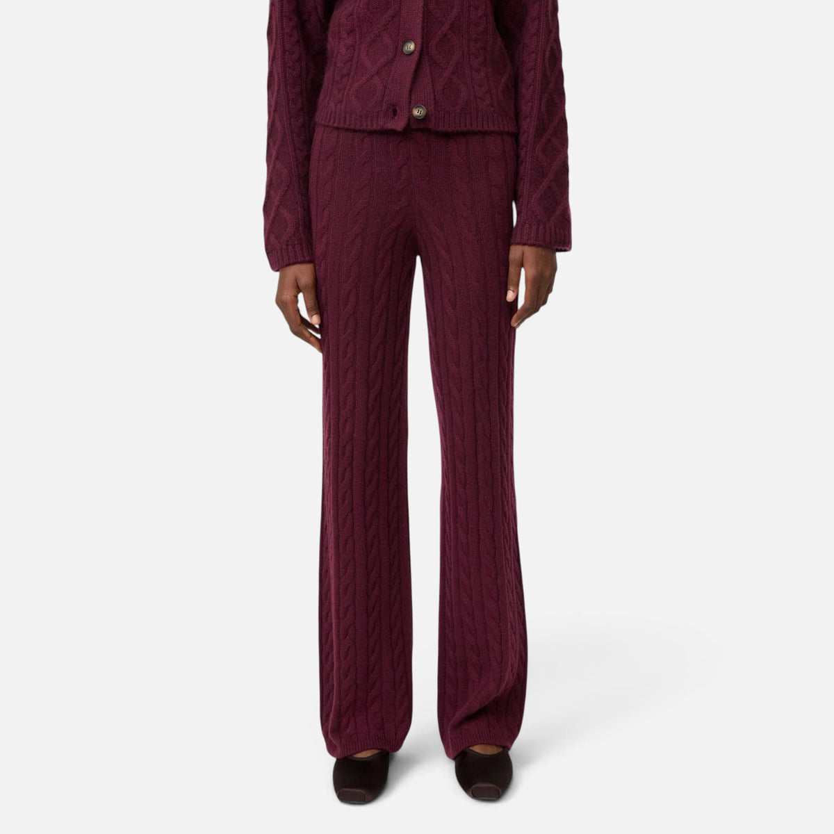 Shop Rescue Spa burgundy cable knit cashmere pants with an elastic waist worn by a model in a regular fit