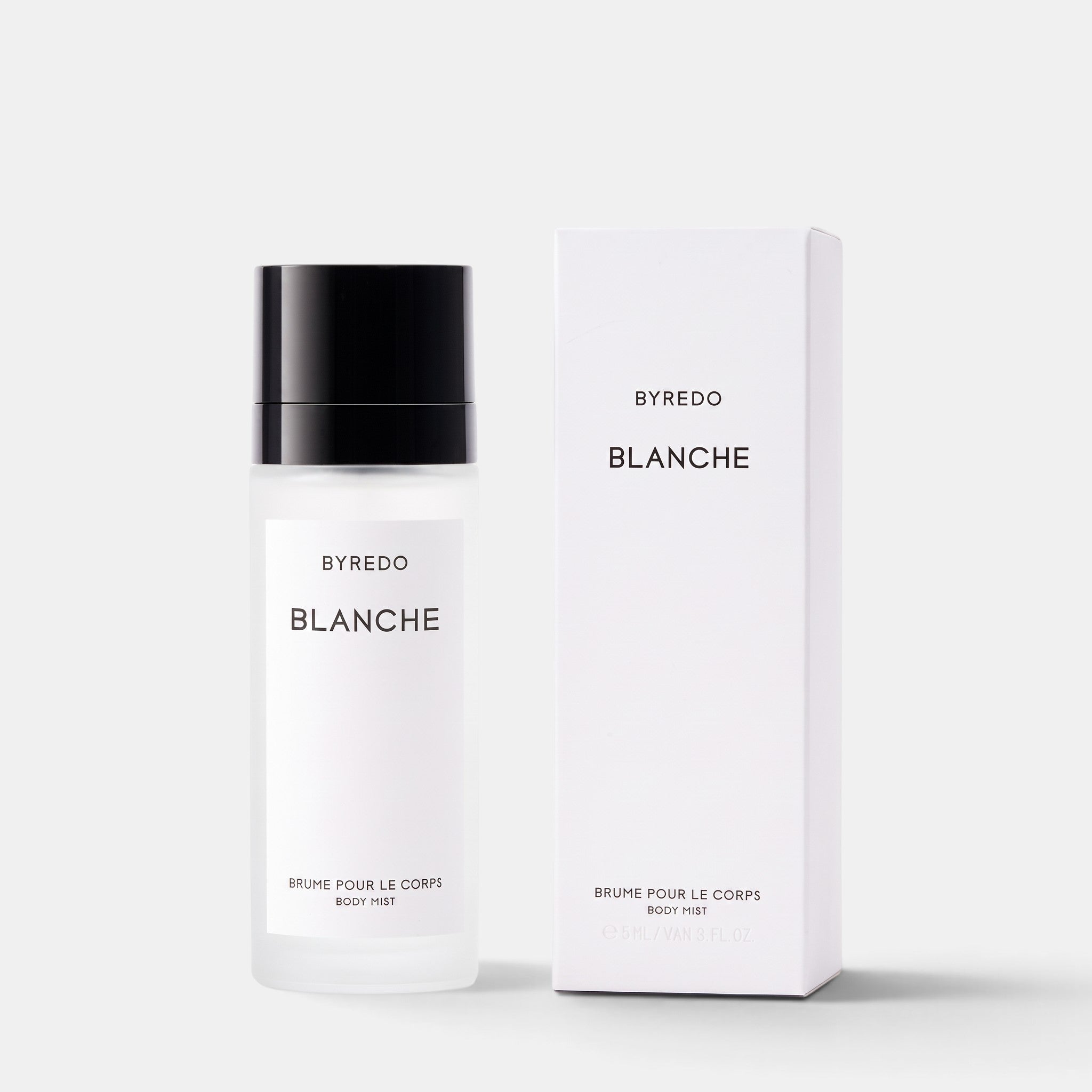 Shop Rescue Spa Byredo Blanche body mist in a frosted glass bottle with a black cap next to its white box packaging.