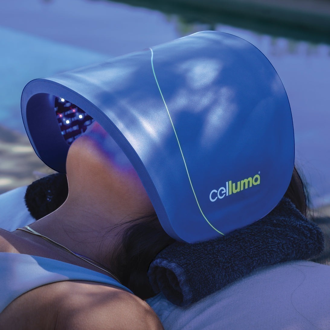 Shop Rescue Spa Celluma FACE LED light therapy device in blue being used for acne and anti-aging treatment