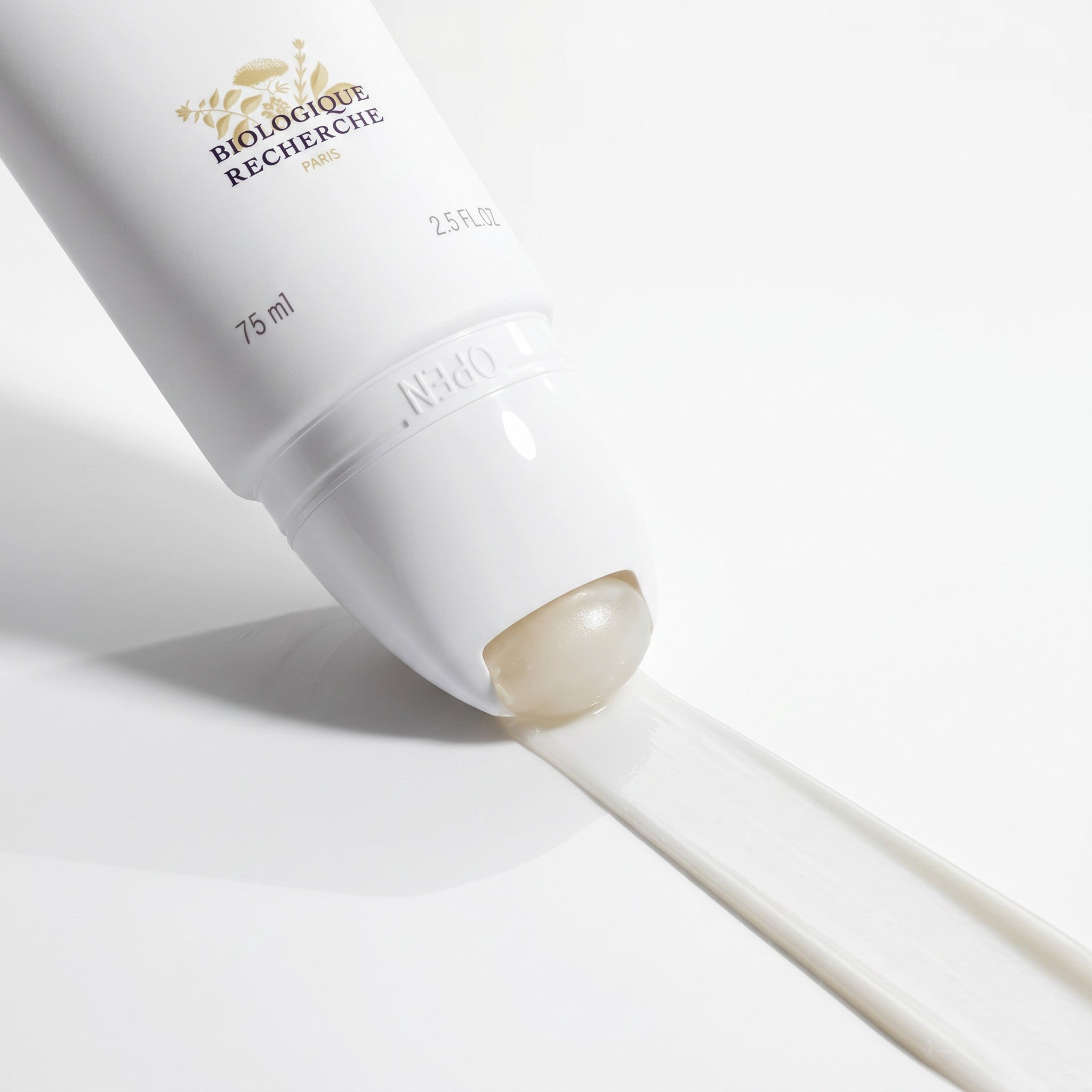 Shop Rescue Spa Biologique Recherche Cible Pigm 400 brightening roll-on treatment with cream texture on white surface