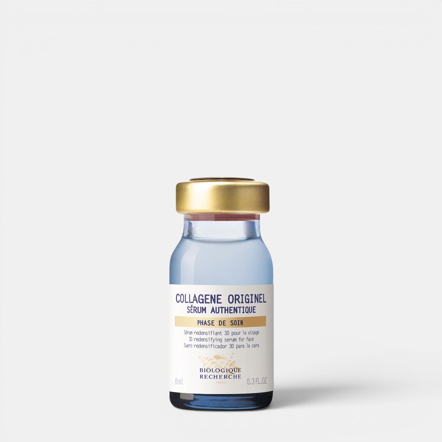 Shop Rescue Spa Collagene Originel 3D redensifying anti-aging face serum in a small blue glass bottle with gold cap.