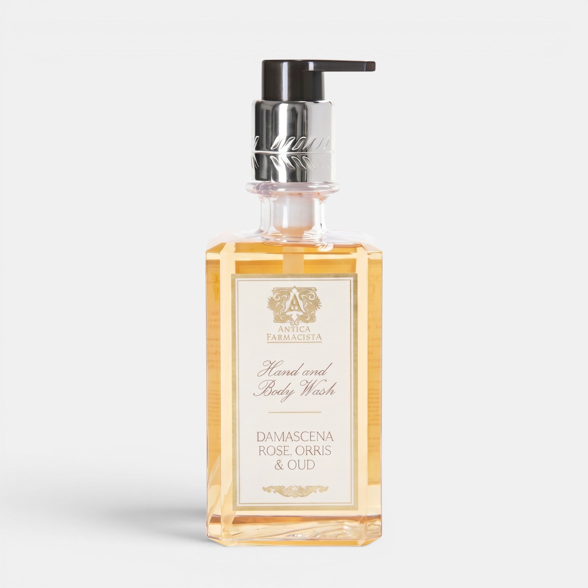 Shop Rescue Spa Antica Farmacista Damascena Rose, Orris & Oud hand and body wash in a clear pump bottle.