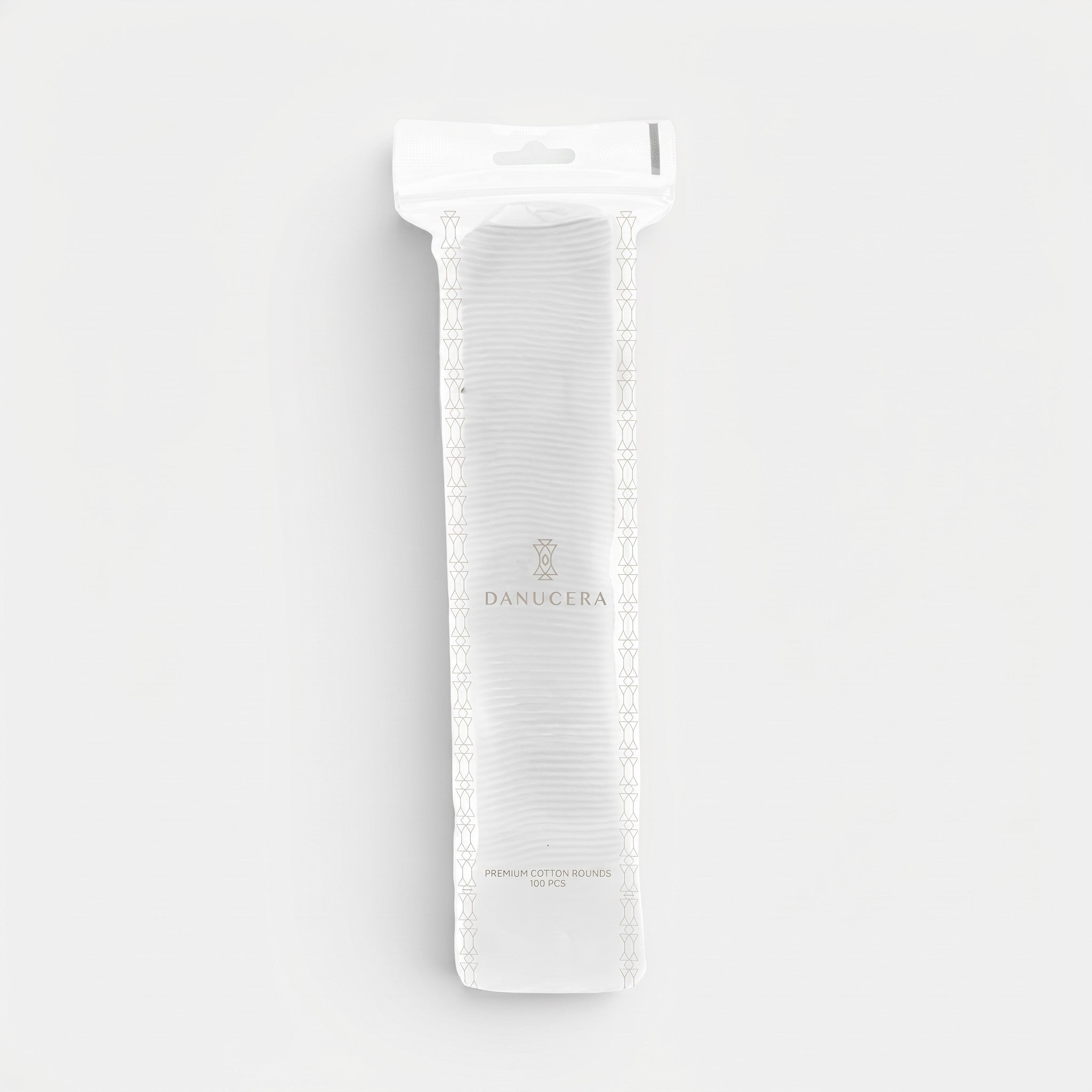 Shop Rescue Spa Danucera premium 100% cotton rounds in a sealed 100-count pack for makeup removal and exfoliation.