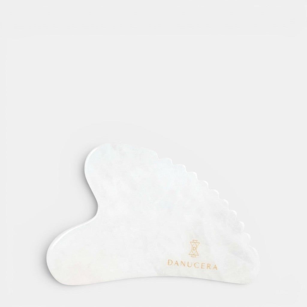 Shop Rescue Spa DANUCERA Sculpting Stone made of white jade for facial massage, lifting, and toning.