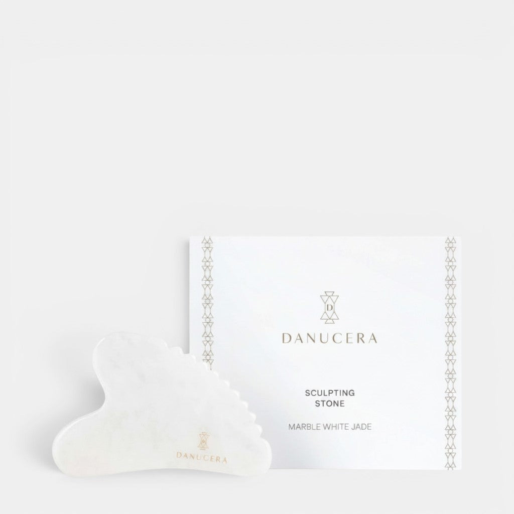 Shop Rescue Spa DANUCERA Sculpting Stone made of natural white jade for facial massage, lifting, and toning.