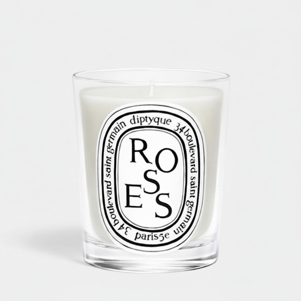 Shop Rescue Spa Diptyque Roses scented candle in a clear glass vessel with a signature oval label