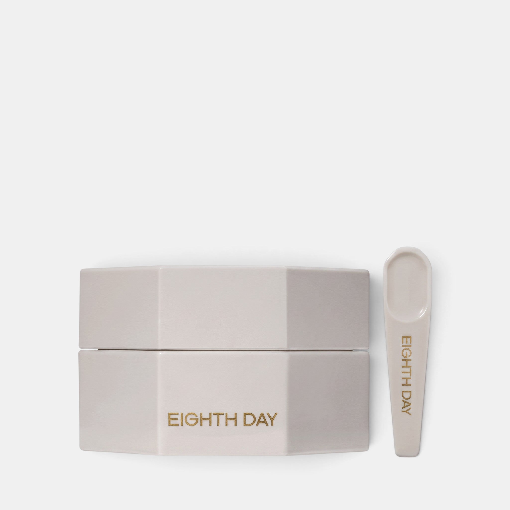 Shop Rescue Spa Eighth Day The Intensive Moisturizer in a hexagonal white jar with a matching applicator spoon