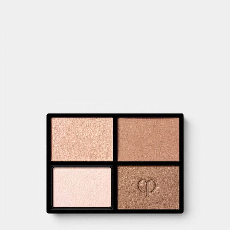 Shop Rescue Spa Eye Color Quad Refill eyeshadow palette with four shades: champagne shimmer, matte brown, pale pink, and bronze with embossed logo.