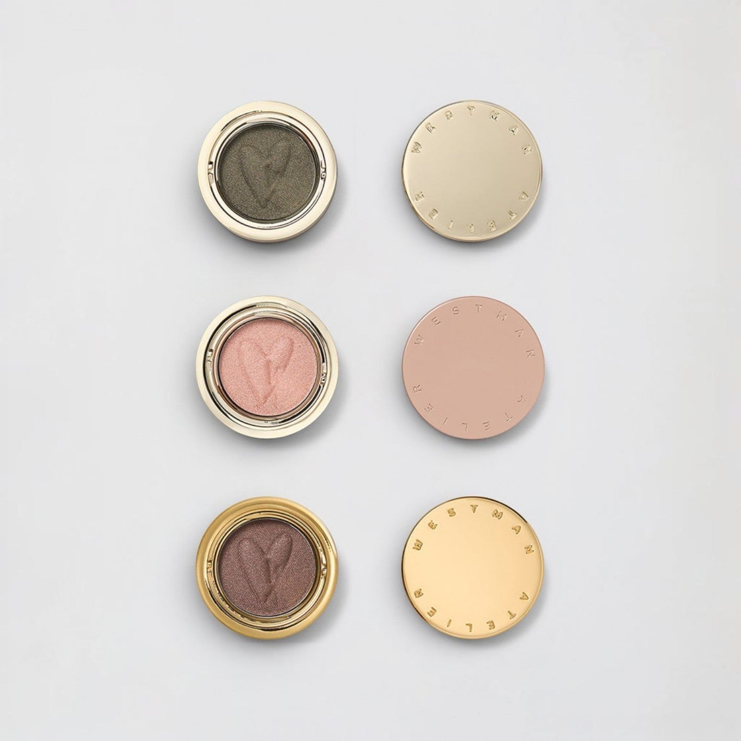 Shop Rescue Spa Rendez-Vous Eye Pods Shadow in olive green, rose gold, and bronze shades with heart imprints.