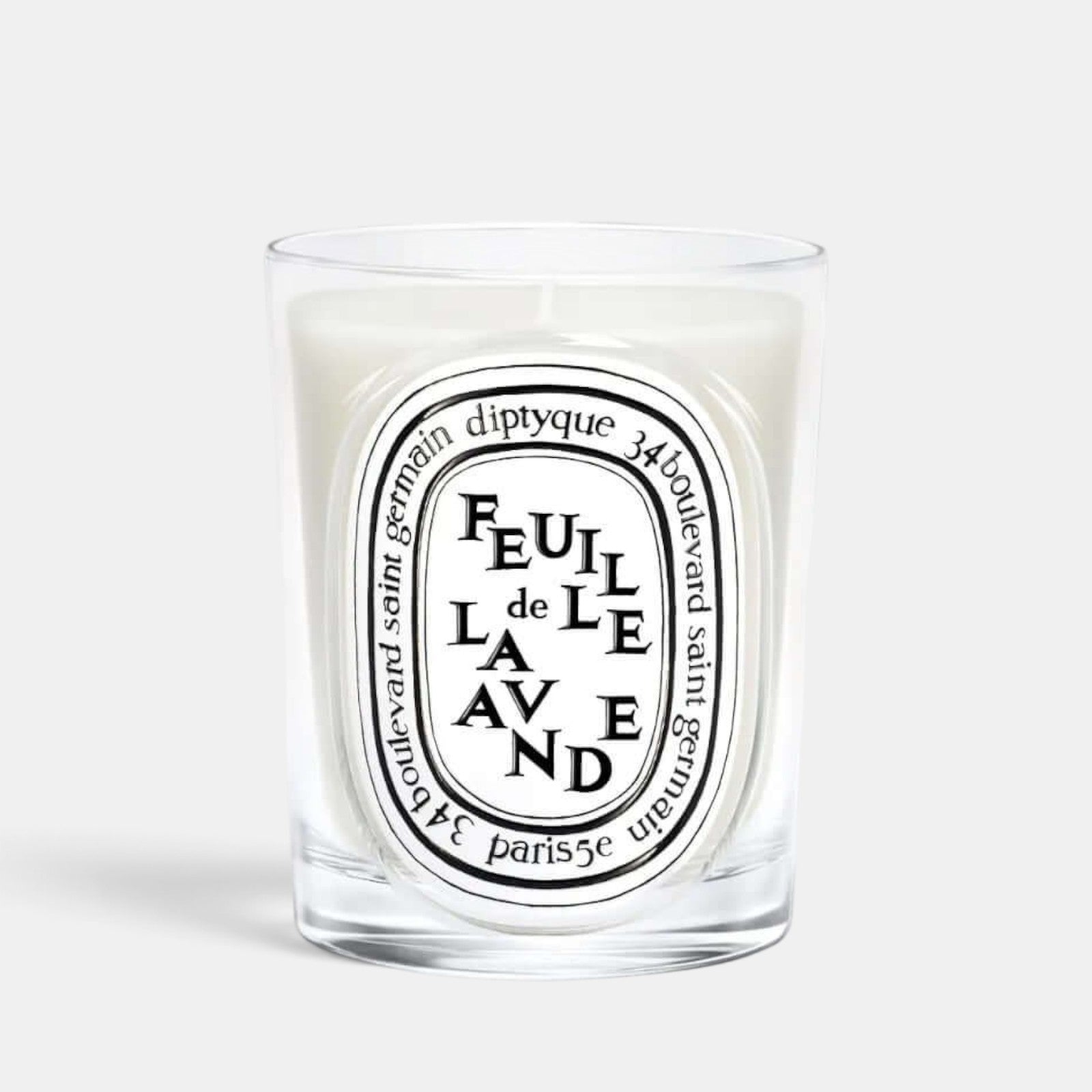 Shop Rescue Spa Feuille De Lavende scented candle in a clear glass vessel with a signature oval label