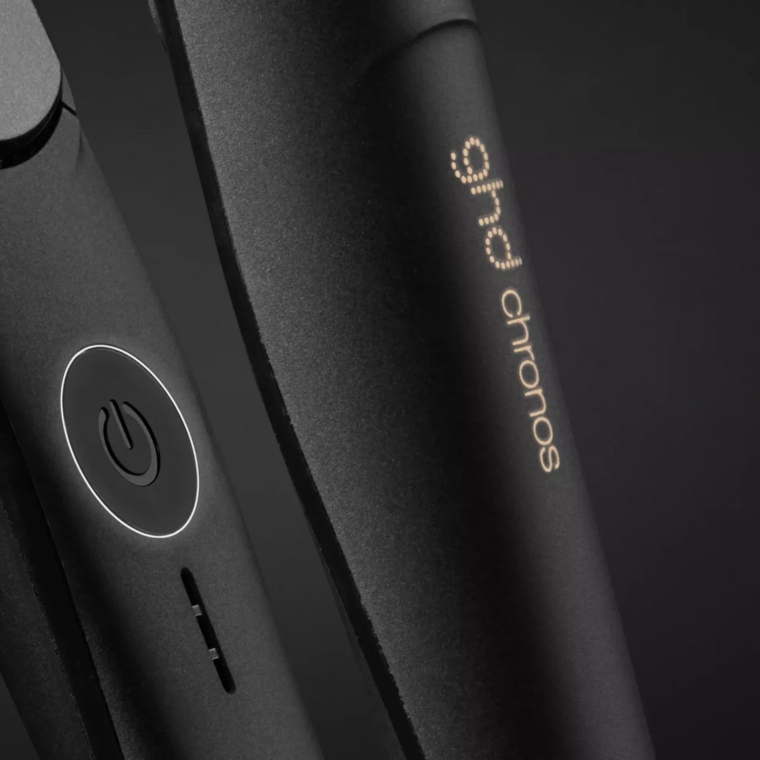 Shop Rescue Spa ghd Chronos flat iron in matte black with power button and motion-responsive technology branding
