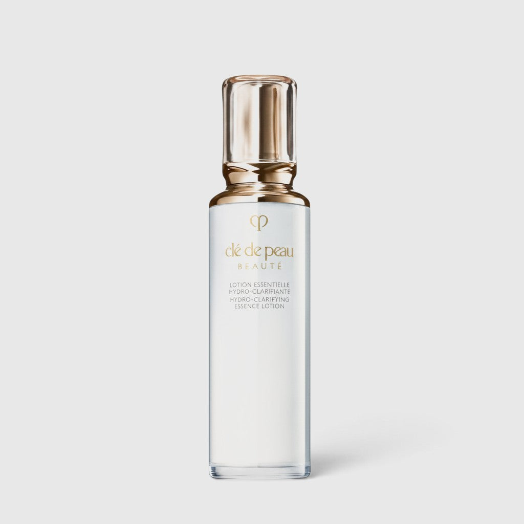 Shop Rescue Spa Hydro-Clarifying Essence Lotion in a sleek white bottle with a metallic gold cap for oily skin.