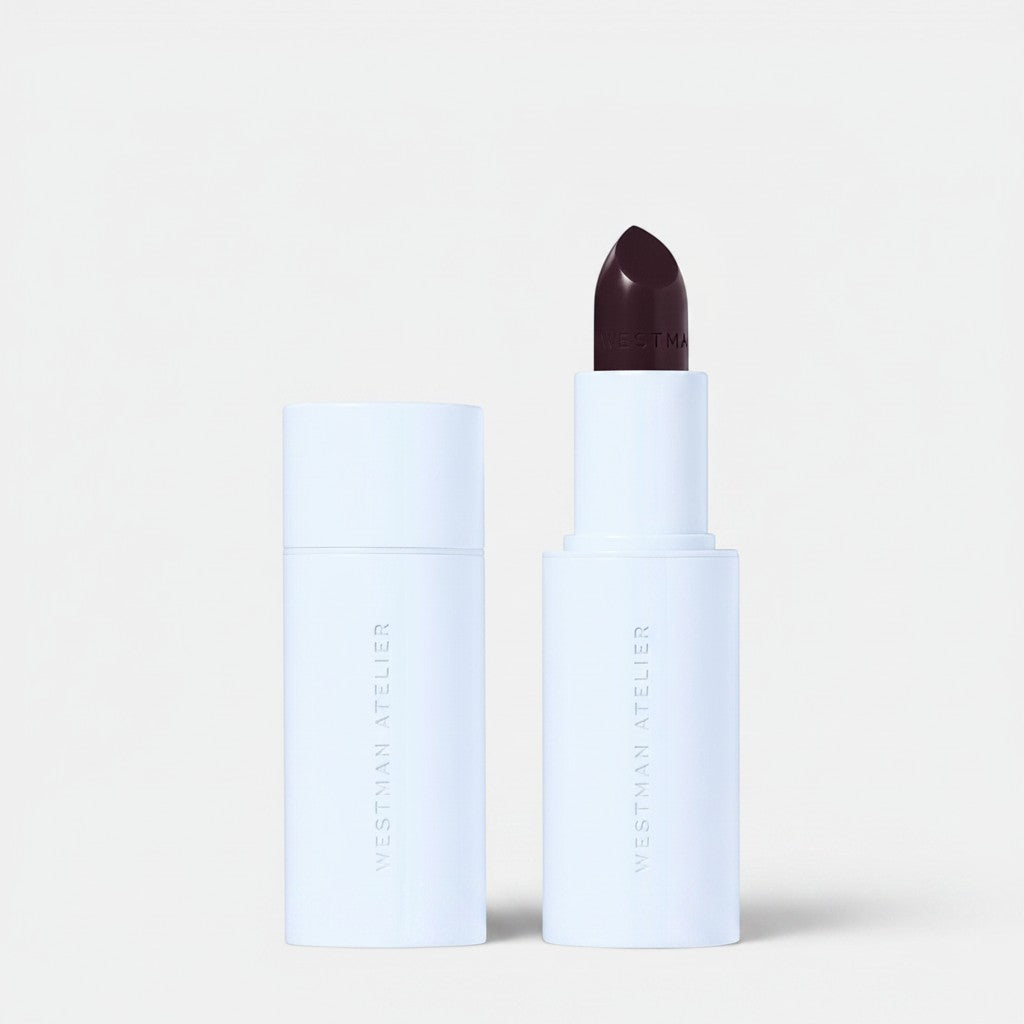 Shop Rescue Spa Hydrobalm Tinted Lipstick in deep plum shade, with hydrating formula and buildable color.