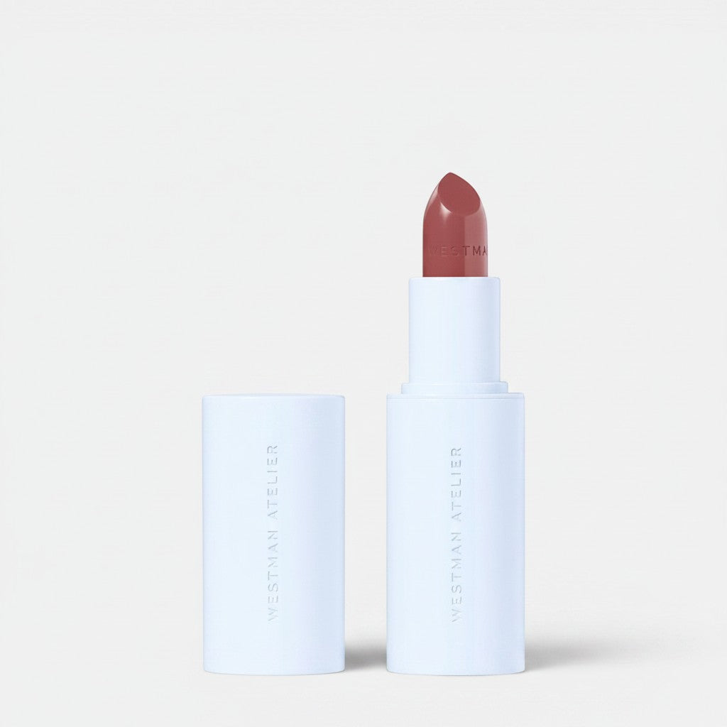Shop Rescue Spa Hydrobalm Tinted Lipstick in a rosy-nude shade, with a hydrating formula and sheer finish.