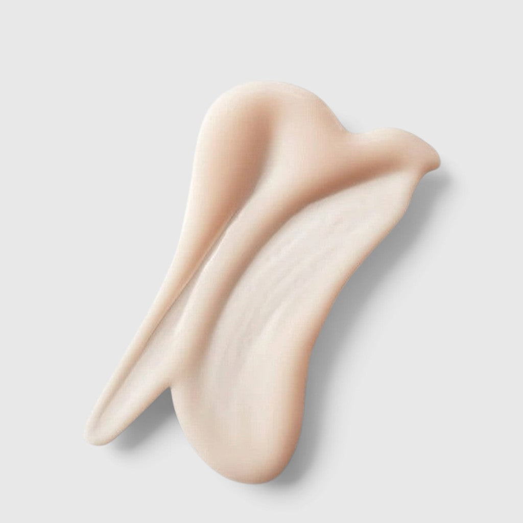 Shop Rescue Spa Intensive Fortifying Emulsion showing a smooth, creamy, pale pink skincare texture swatch