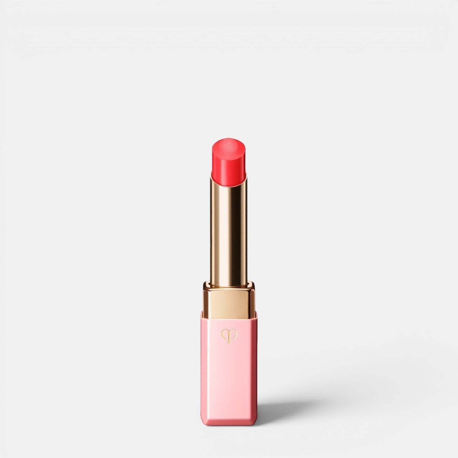 Shop Rescue Spa Lip Glorifier tinted lip balm in coral pink, hydrating and smoothing for a dewy glow.