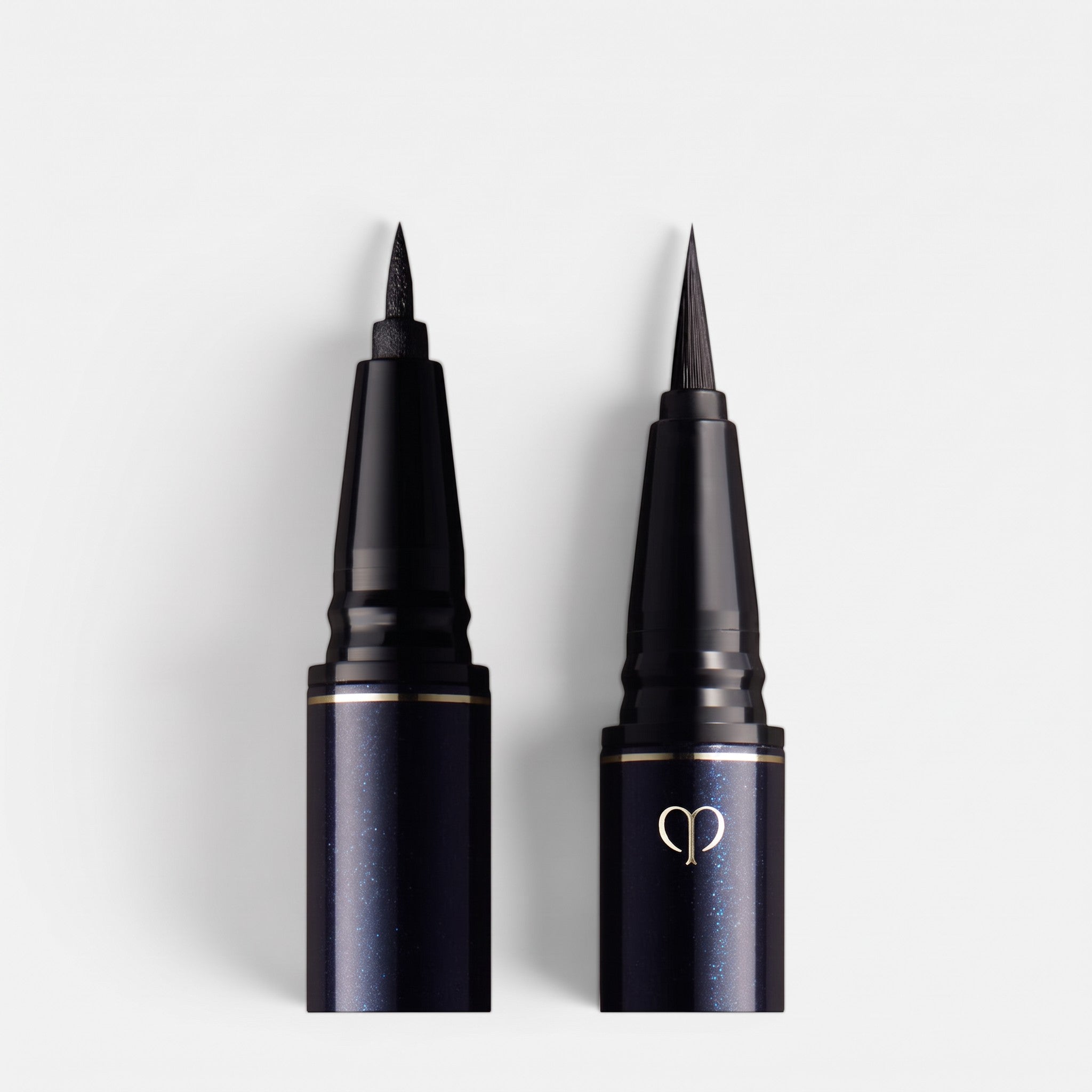 Shop Rescue Spa Intensifying Liquid Eyeliner with two distinct applicator tips for precise and bold eye definition.