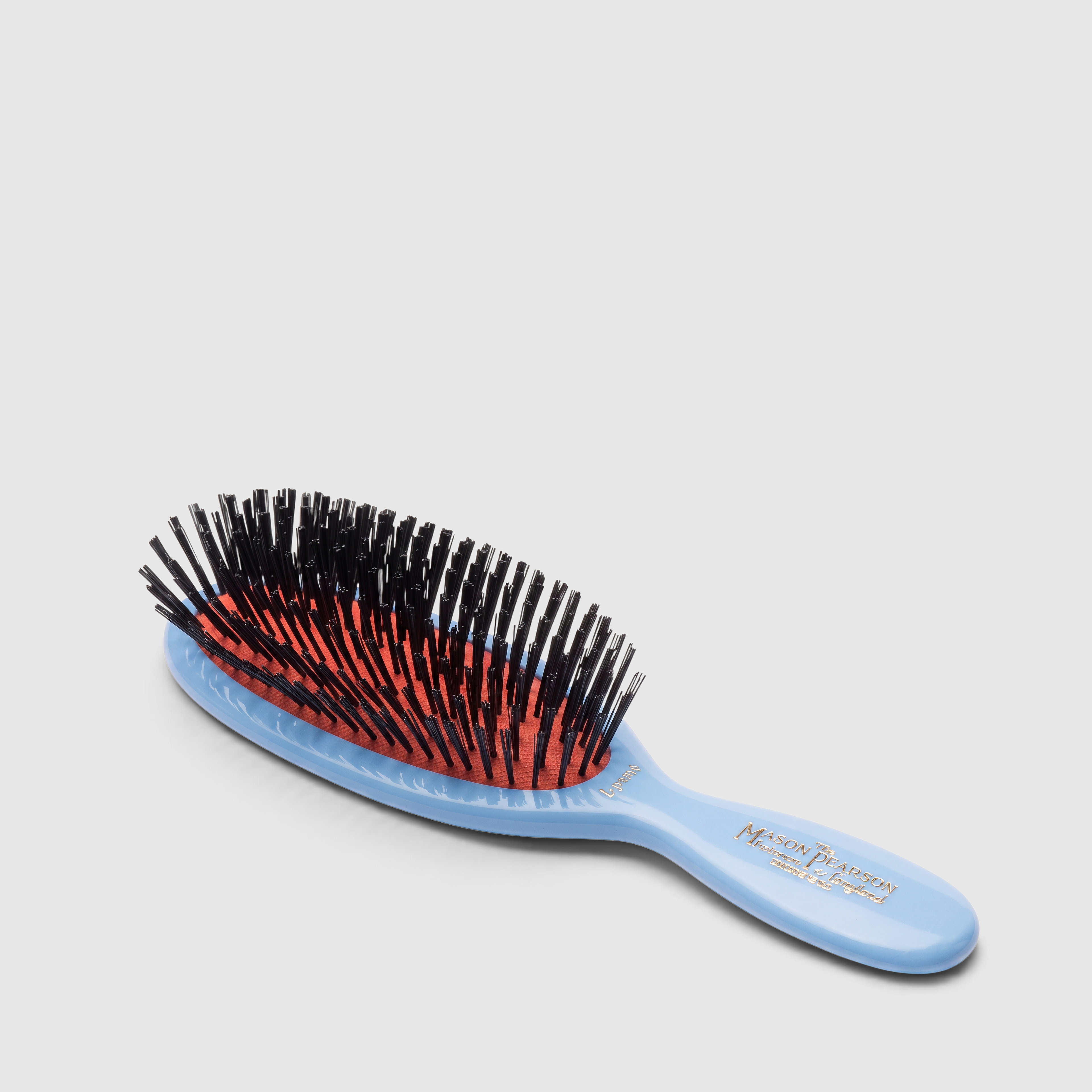 Shop Rescue Spa Mason Pearson pocket-sized child hairbrush with a light blue handle and natural boar bristles