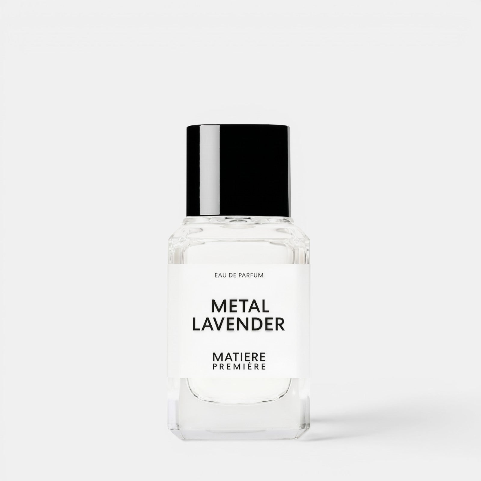 Shop Rescue Spa Metal Lavender eau de parfum in a clear glass bottle with a black cap against a white background.