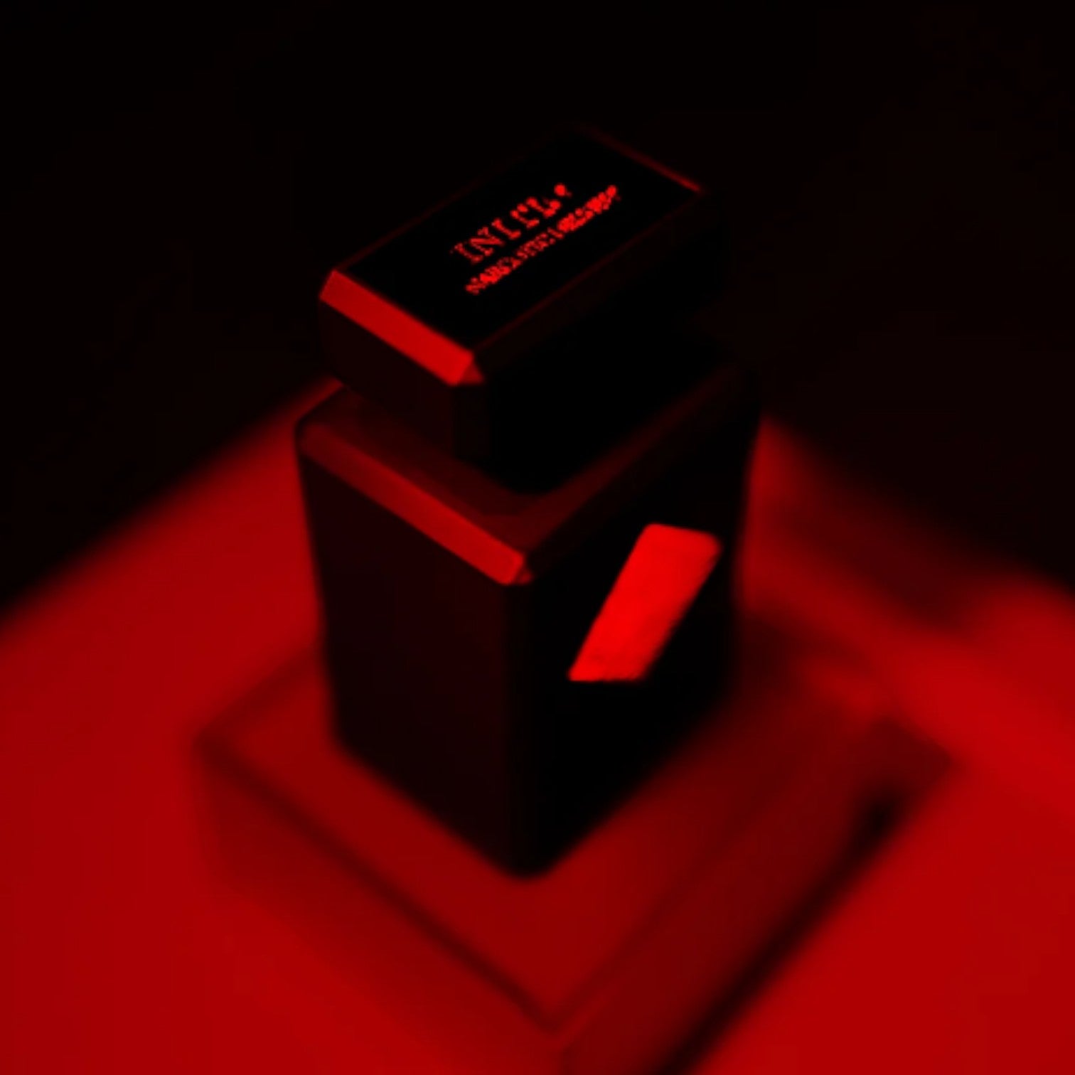 Shop Rescue Spa Narcotic Delight Eau De Parfum 90ml bottle with red lighting, featuring notes of cherry, cognac, and vanilla.