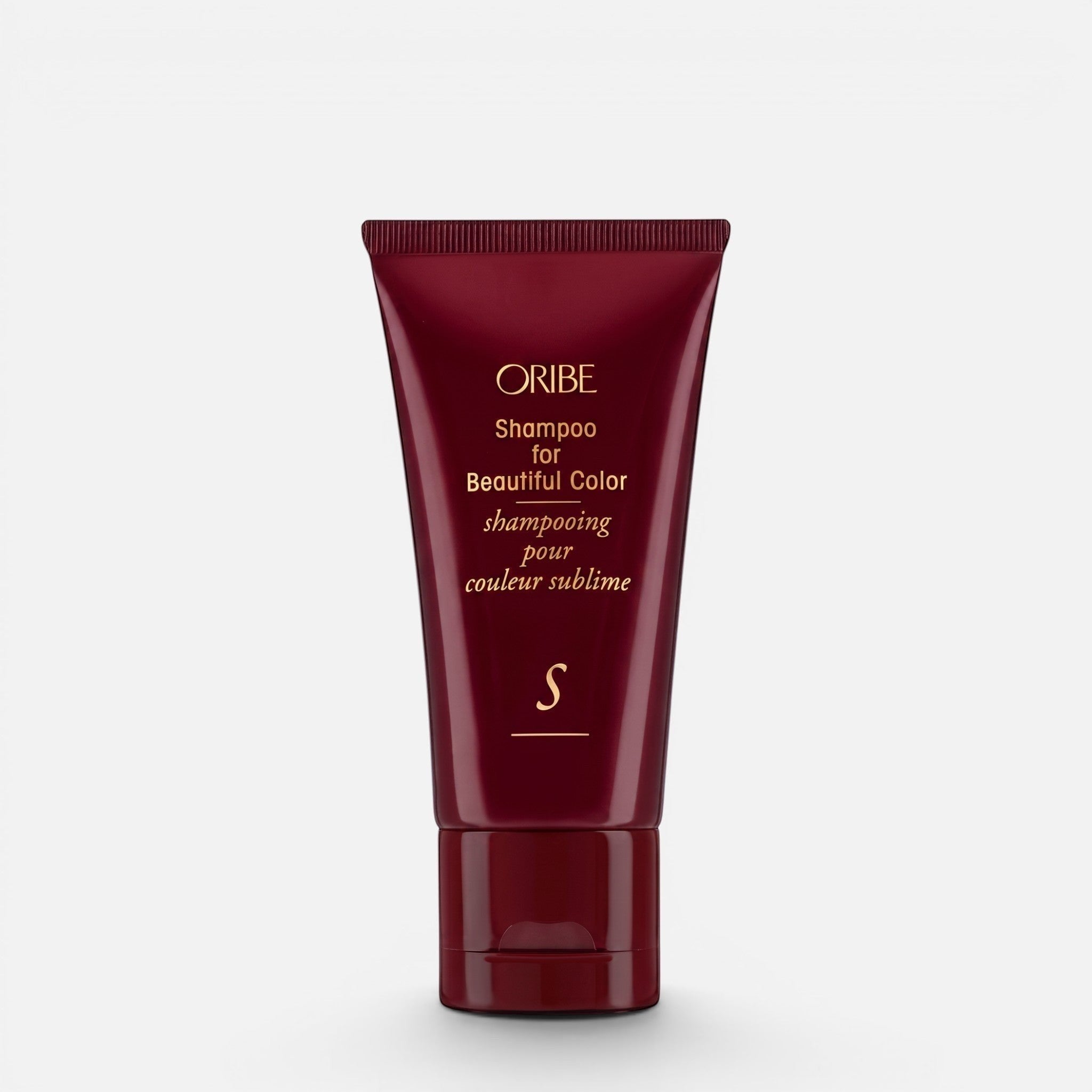 Shop Rescue Spa Oribe Shampoo for Beautiful Color in a deep red travel-size tube for color-treated hair.