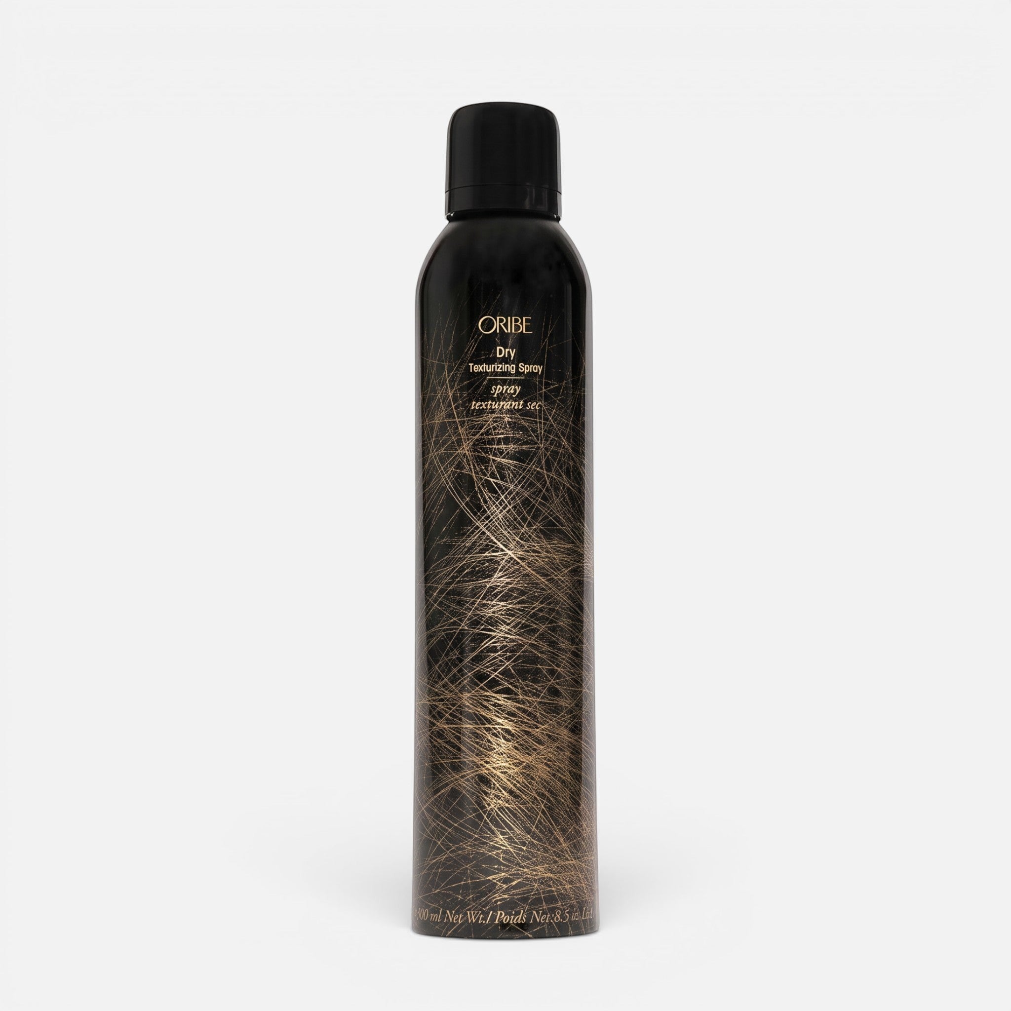 Shop Rescue Spa Oribe Dry Texturizing Spray bottle for volumizing hair and absorbing oil with a black and gold design.