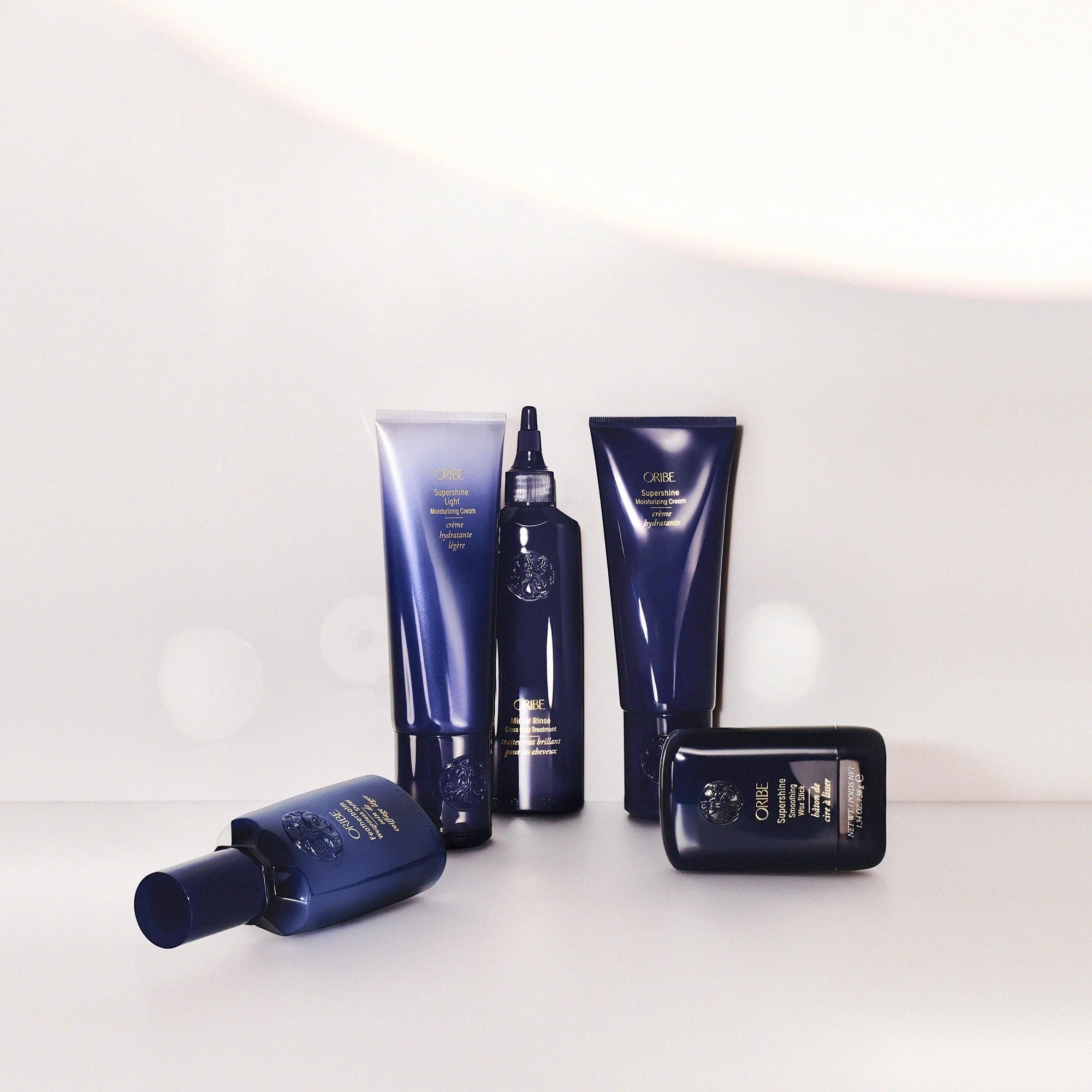 Shop Rescue Spa Oribe Featherbalm Weightless Styler for fine to medium hair, adds light hold and shine.