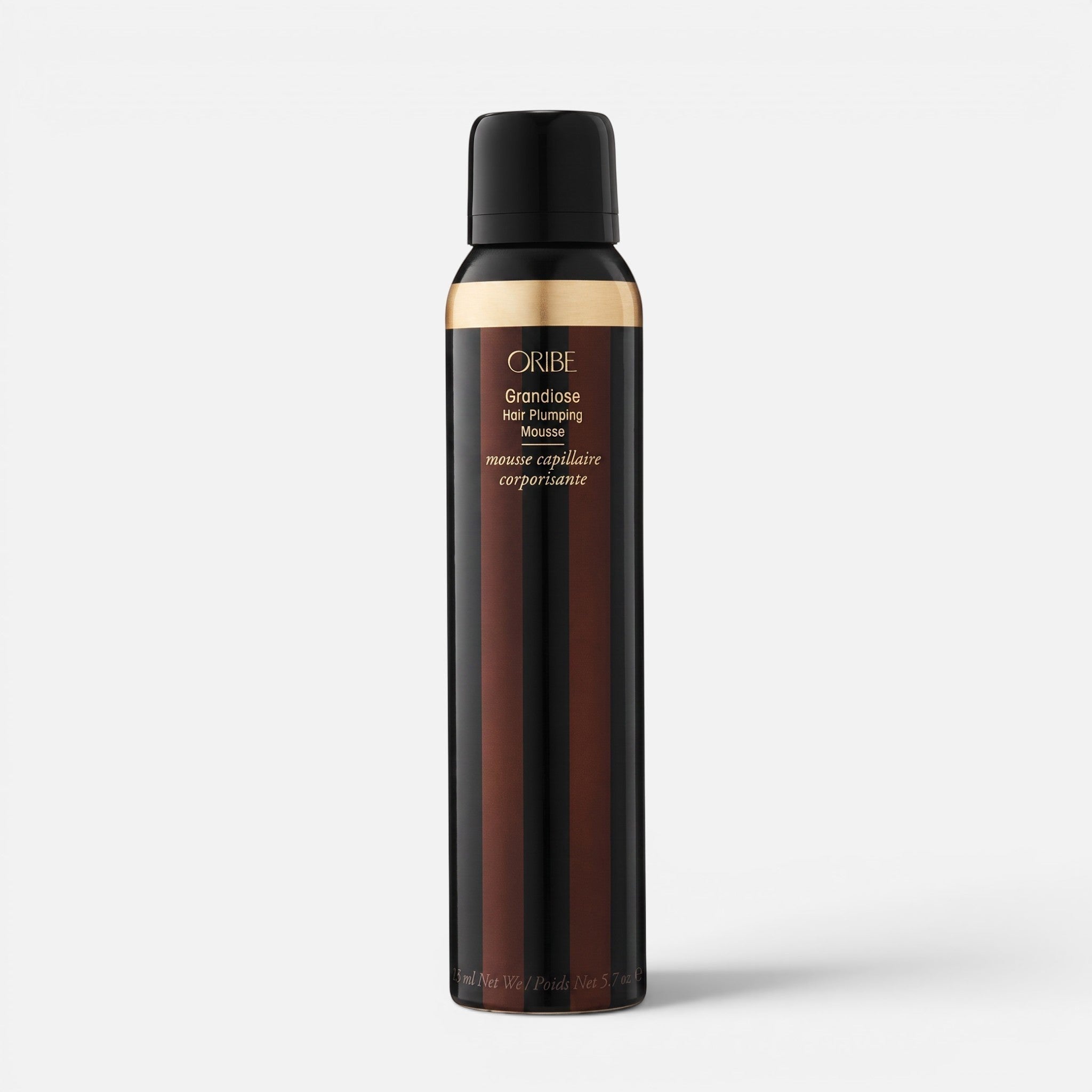 Shop Rescue Spa Oribe Grandiose Hair Plumping Mousse in a sleek black and gold 5.7 oz bottle for voluminous hair.