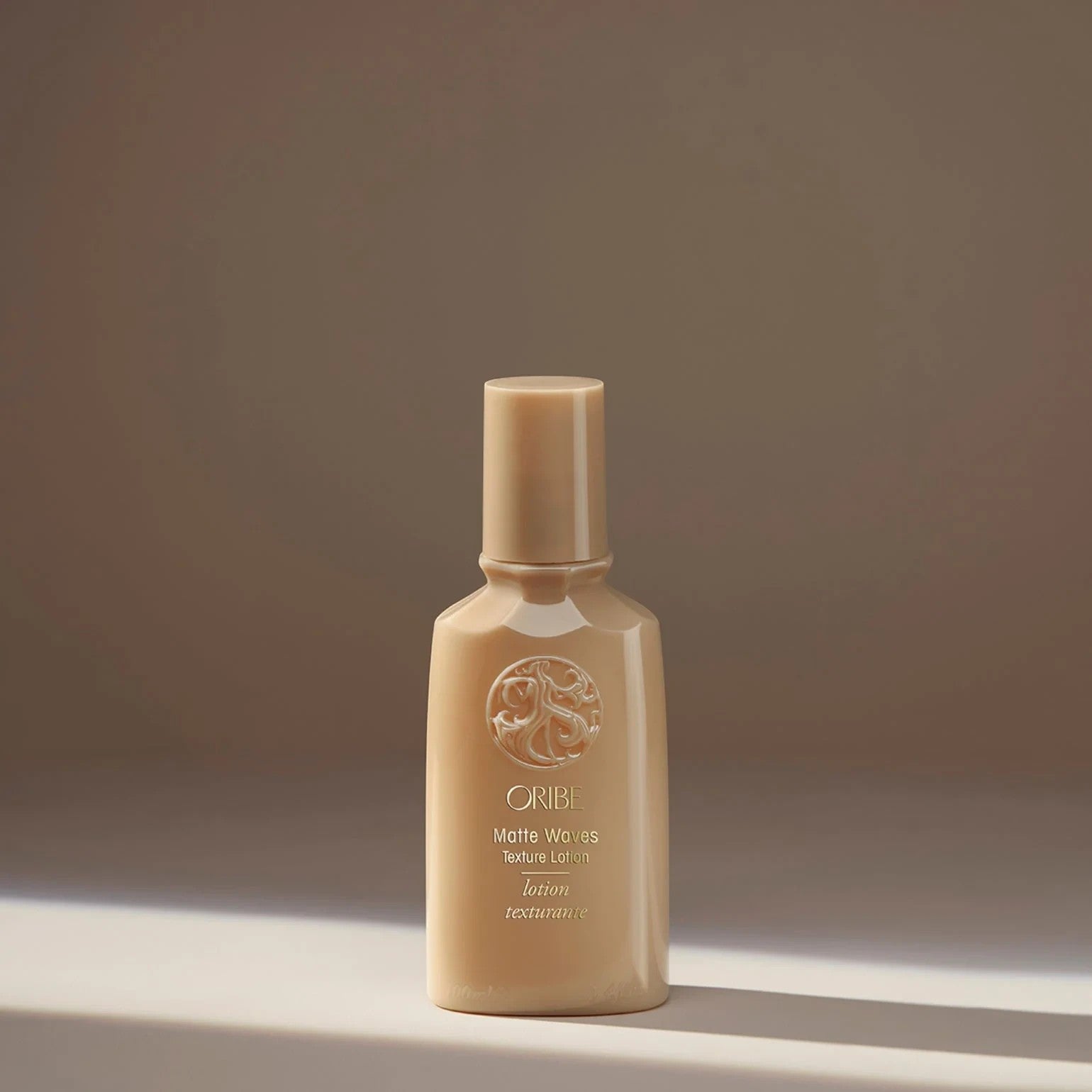 Shop Rescue Spa Oribe Matte Waves Texture Lotion for beachy waves and matte finish. Light lotion formula.