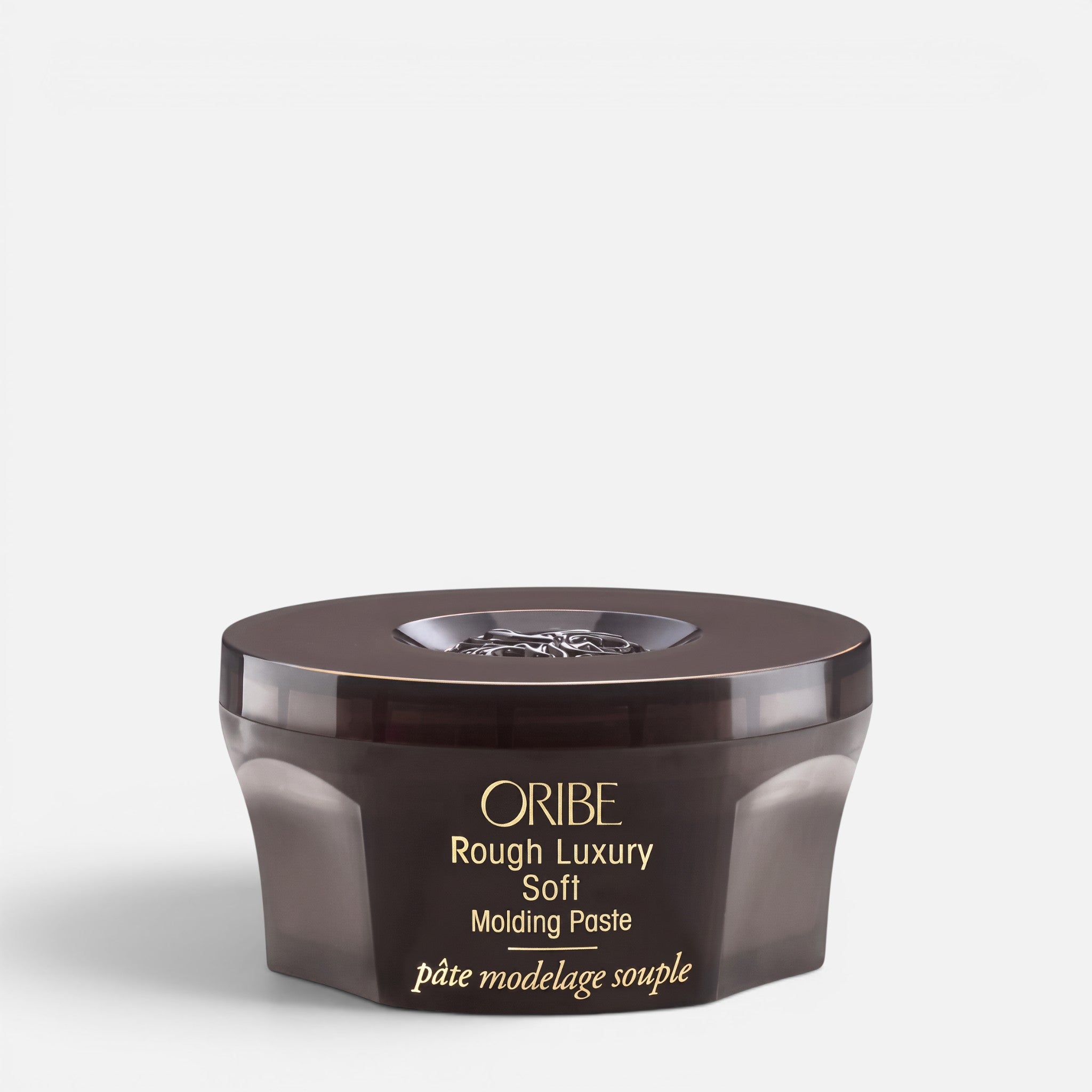 Shop Rescue Spa Oribe Rough Luxury Soft Molding Paste in a dark brown jar for hair definition and texture.