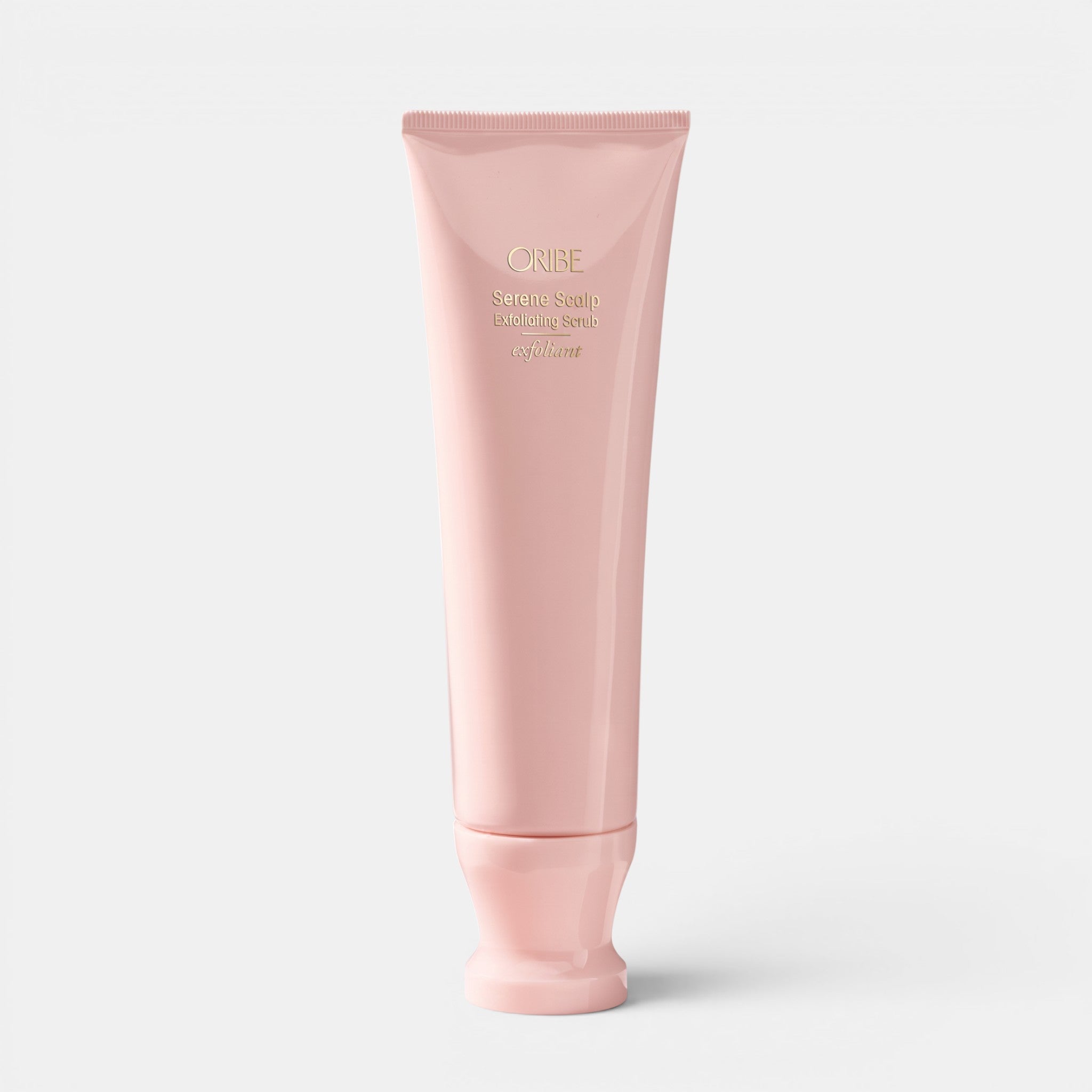 Shop Rescue Spa Oribe Serene Scalp Exfoliating Scrub in a pale pink 125ml squeeze tube for scalp purification.