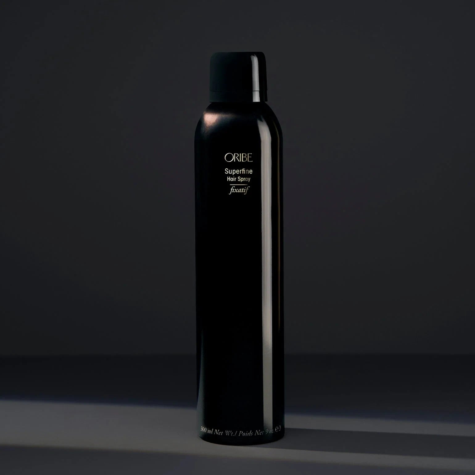 Shop Rescue Spa Oribe Superfine Hair Spray in a sleek black 300ml aerosol bottle for flexible, brushable hold.
